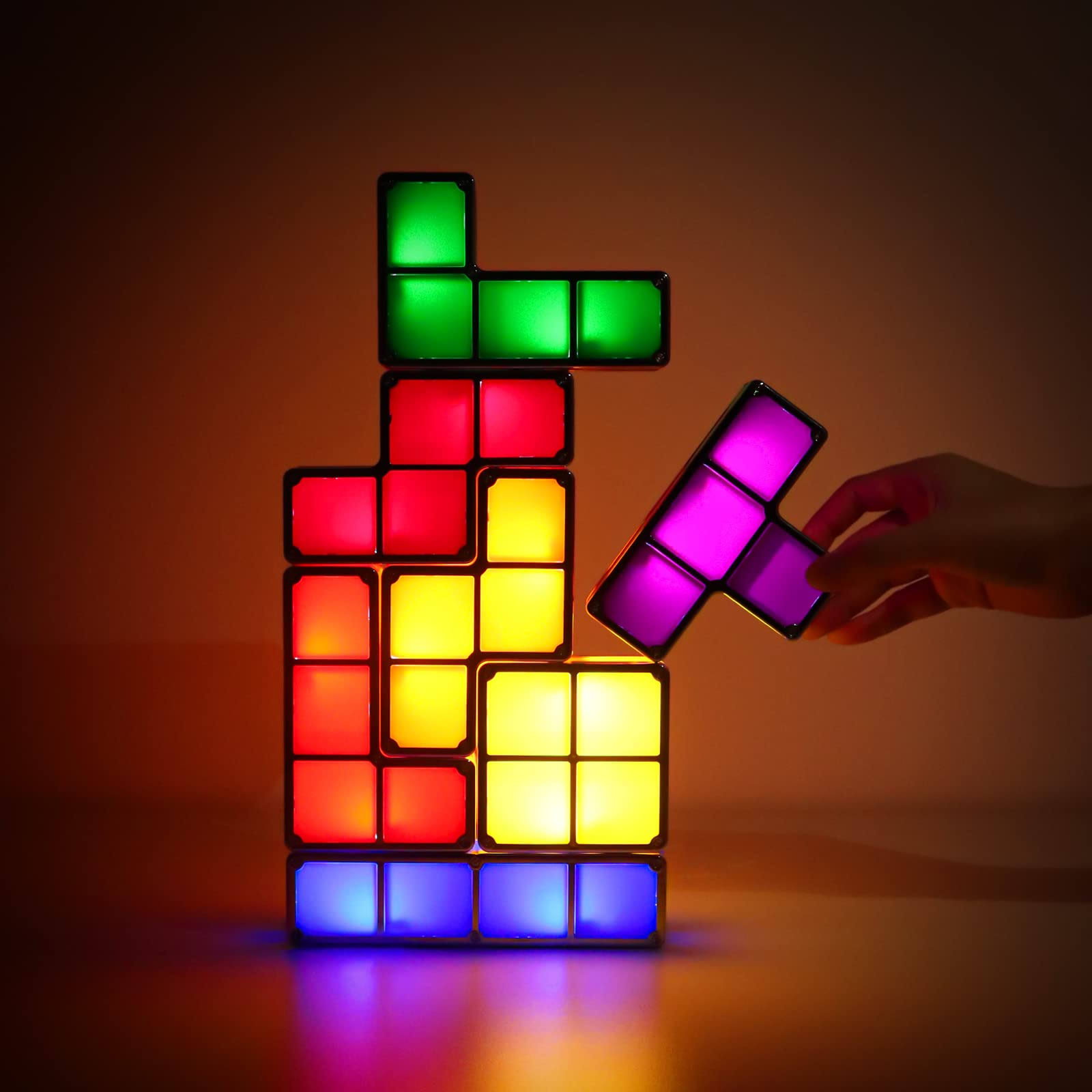 031d8897e9db6502051e34eb8a10a6bbbc6e1fe4990e6538590c089f8e4293d4.jpg Night Light for Kids, VEEKI Stackable LED 7 Colors 3D Puzzles Night Light Induction Interlocking Desk Lamp, DIY Tangram Light Blocks Puzzles Lamp - Image 1
