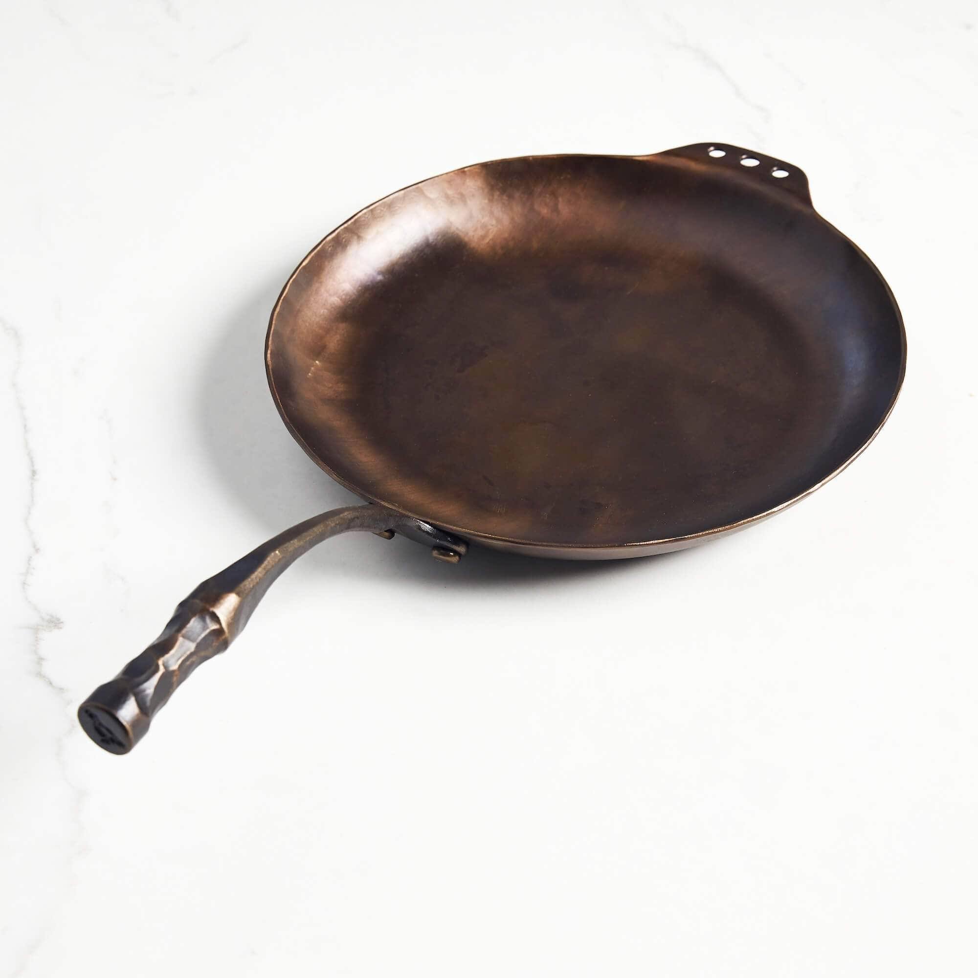 065204713b4179fd3452746ddc3f0222257d8d39d22df2f1e4b970e567d96bf3.jpg Smithey Carbon Steel Farmhouse Skillet - Image 1
