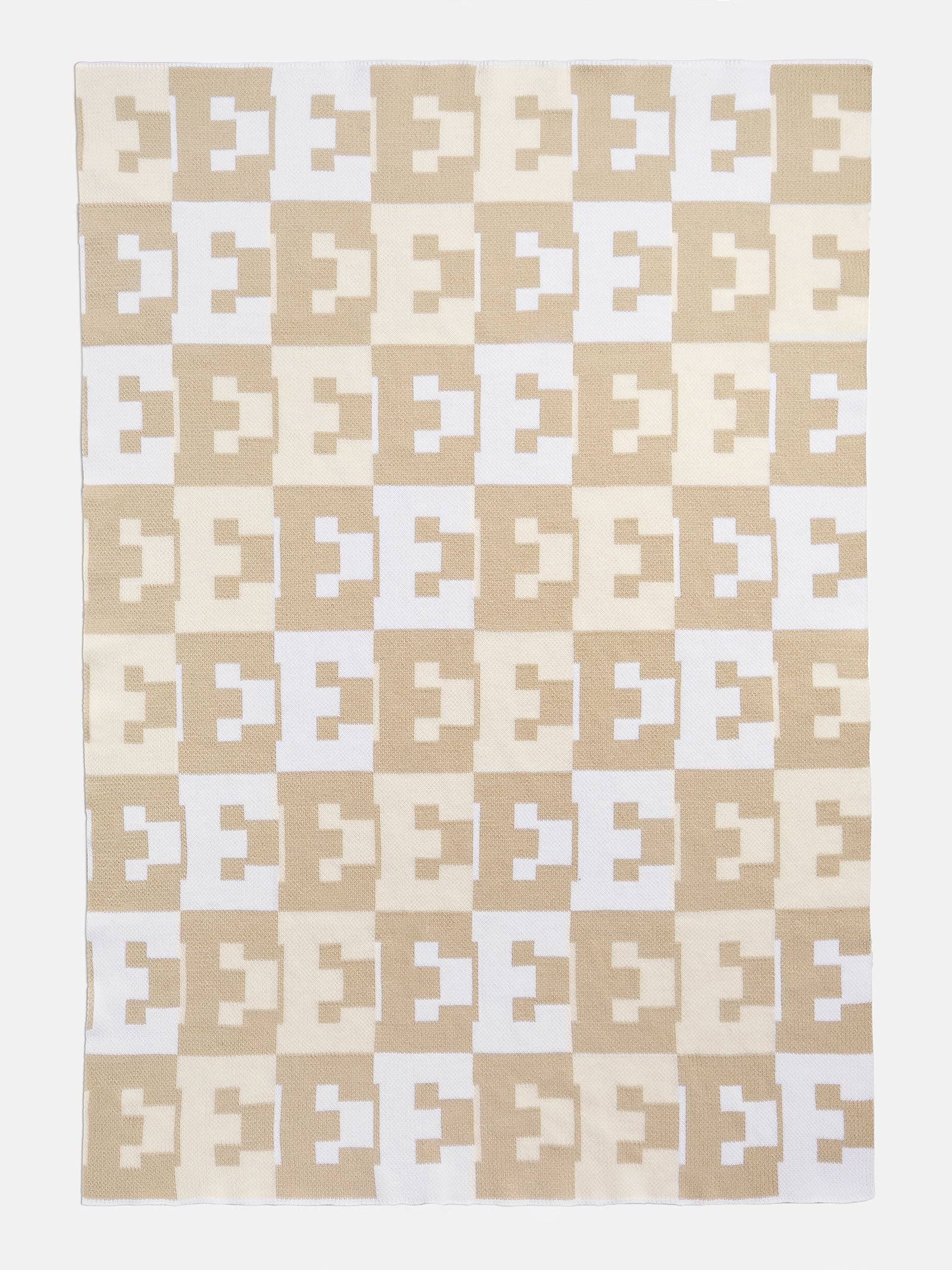 06b4154534cc70f7a0b4eb3289327065c8e5d2ba9a3959159edb9fc4b090eac4.jpg Baublebar on Repeat Letter Blanket in Neutral-A - Image 1