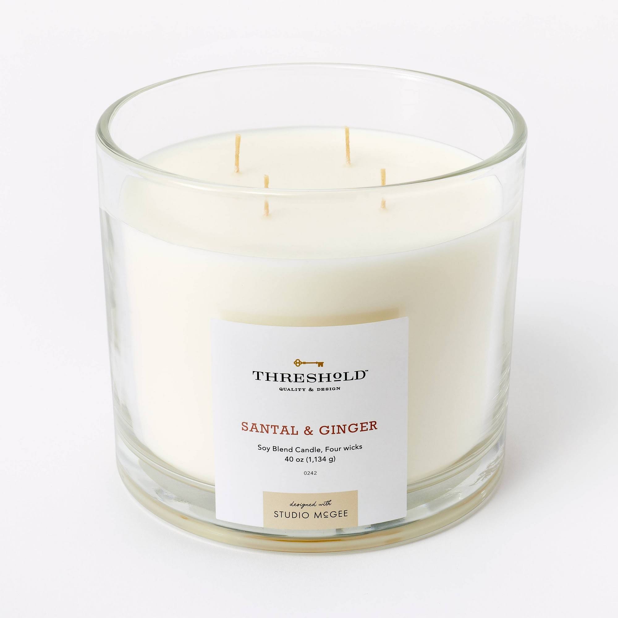 0704b6cf5c29914aecf48a7e7b3b17136c02f94e48cbeb99f336f191f708392b.jpg 40oz Clear Glass Santal & Ginger Candle White - Threshold Designed with Studio McGee - Image 1