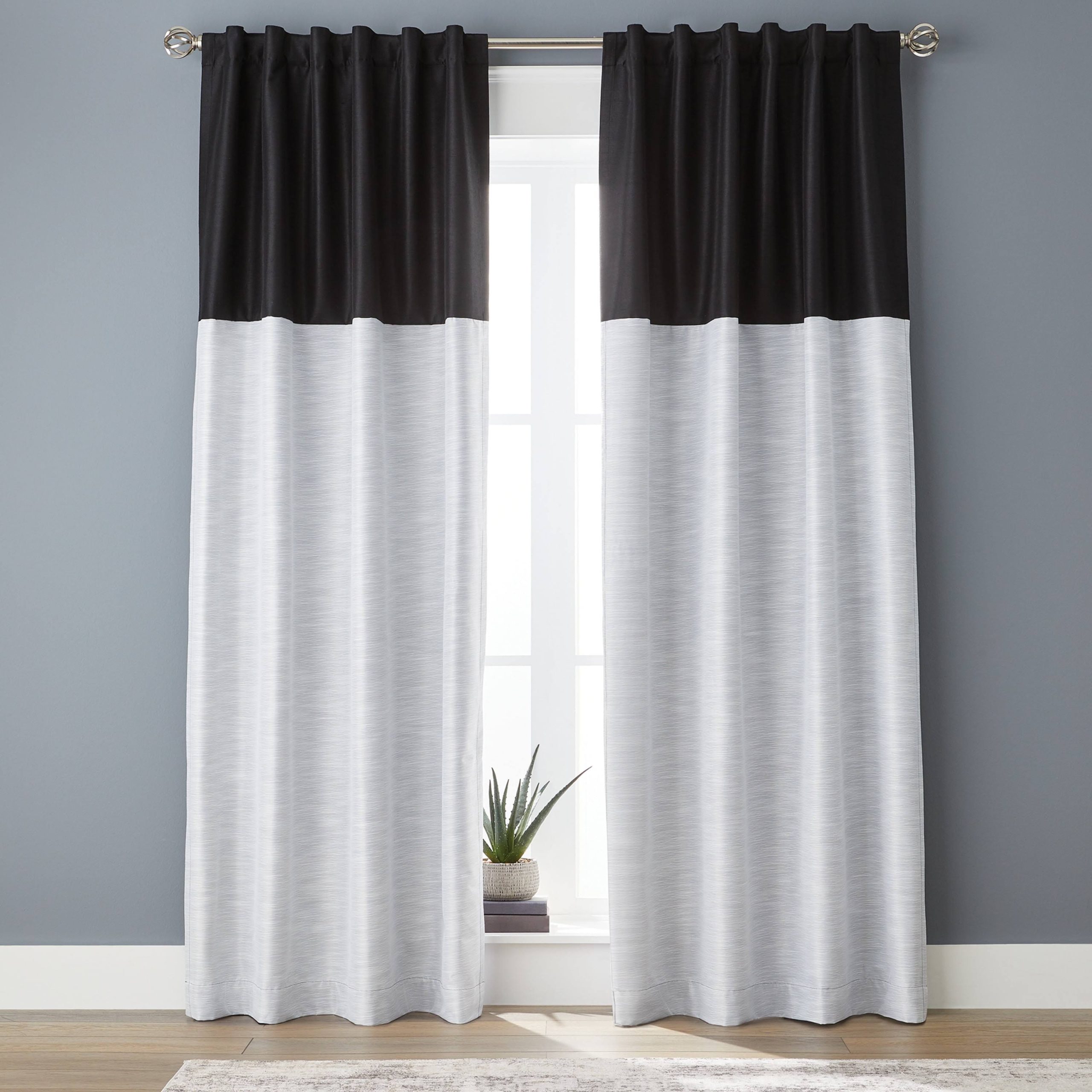 071c4a2e298c477b24ebcdfdbfb9d3727b53766c502e0b8c4e320f3e32eb1ac1.jpg Better Homes & Gardens Colorblock Solid Polyester Pole Top Blackout Single Curtain Panel , 50 inchx84 inch , Black, Size: 50 inch x 84 inch - Image 1