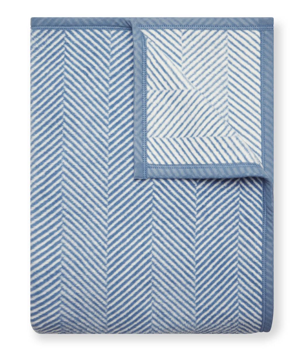 083fb33c77061a29432293085524f1d1ac7f3ae5ed0664e0d7c387cec434bb80.jpg ChappyWrap Harborview Herringbone Blanket - Light Blue - Image 1