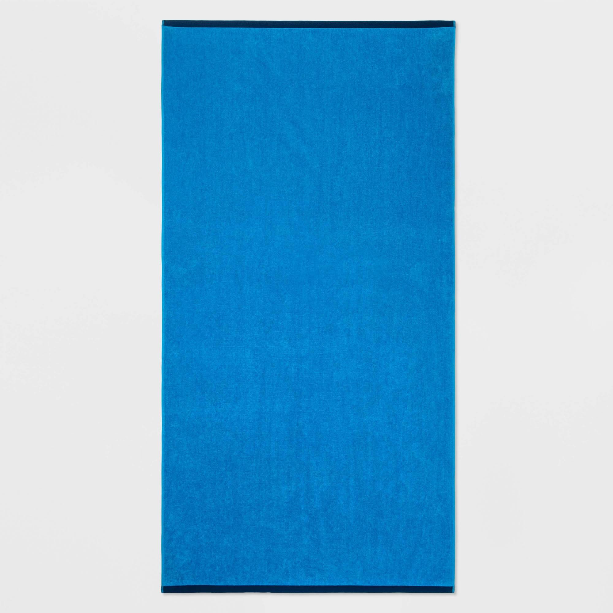 0bd3704b3d2d74b118a3a36fbffe7a10d5e140f96b83839c9977657f6fbd5c9b.jpg Wow Reversible Beach Towel Blue - Sun Squad - Image 1