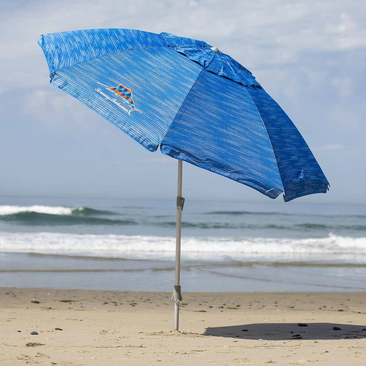 0cc29db8726035b6953a88ce5fedf4c1dbc534c899fc67694cb94d2254009504.jpg Tommy Bahama 8ft Beach Umbrella Blue - Image 1