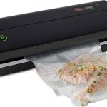 Foodsaver FM2000 Vacuum Sealer Machine with Starter Bags Rolls - Black