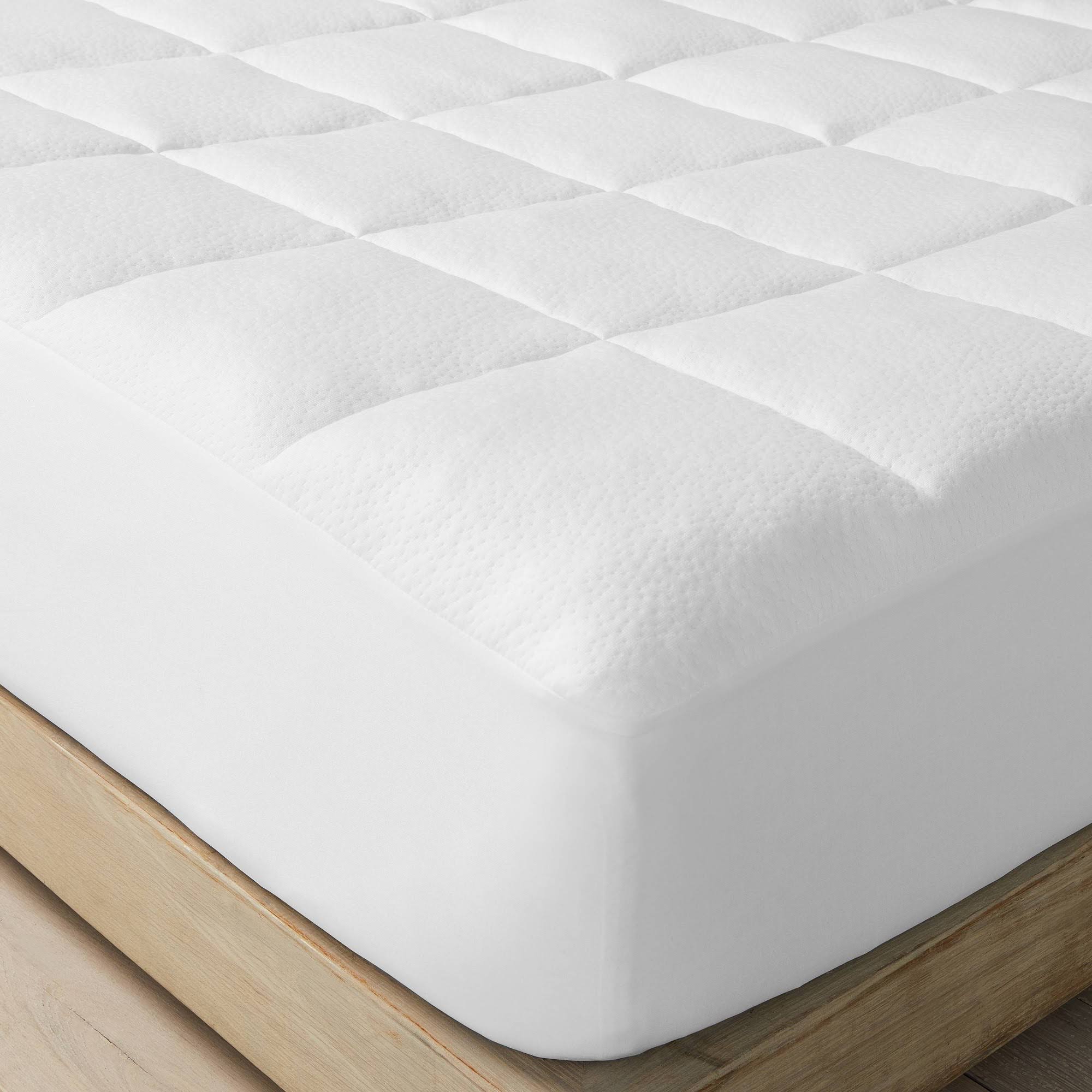 0d91c1da0c4e70b233dc397f54eaed426ba44ae2f85b6a5088778e4fc940329d.jpg Casaluna Memory Foam & Down Alternative Mattress Pad, Full - Image 1