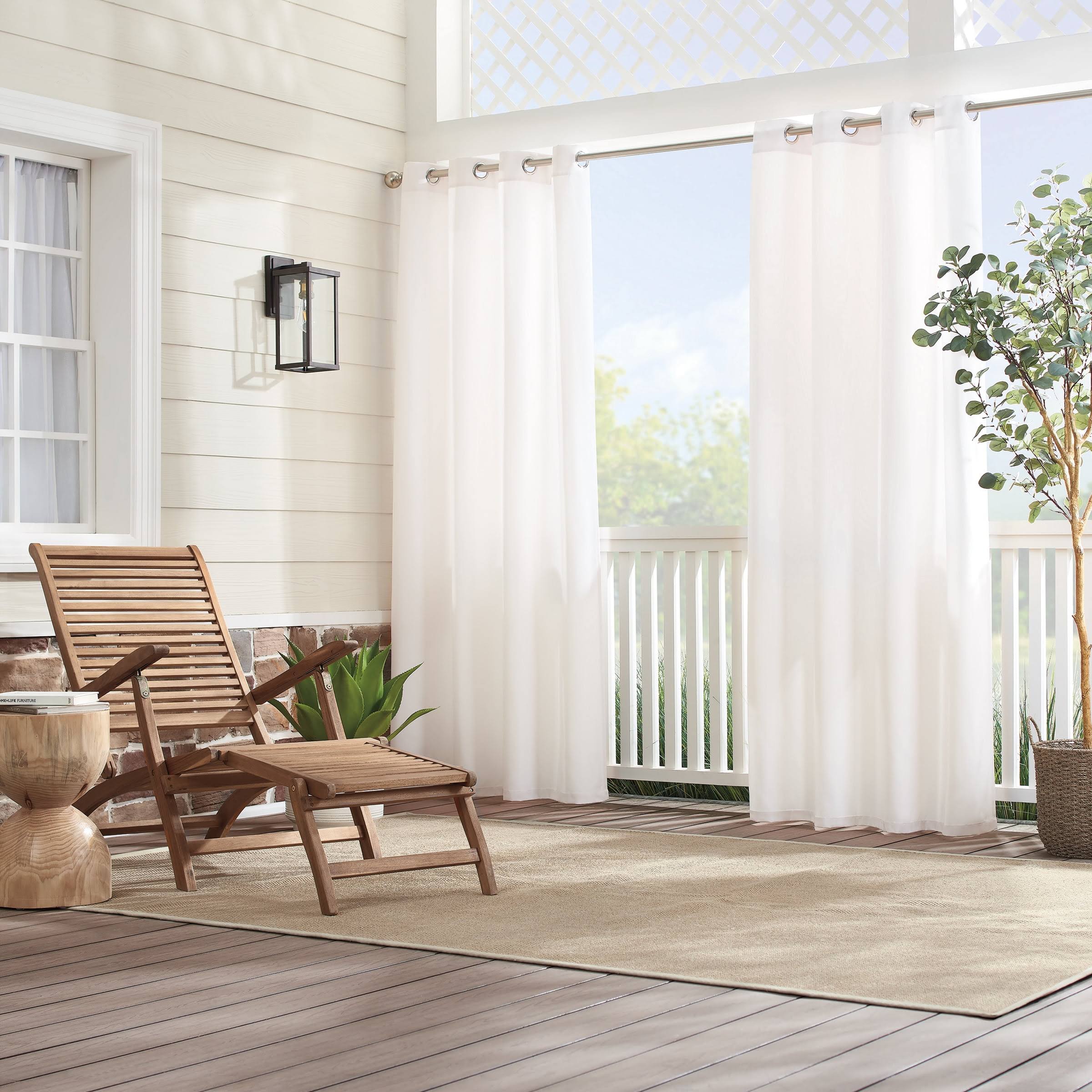 0df3772e6b06faf2790179c2c367825f8db5214aa10563cfc118d5de83259823.jpg Sunbrella Solid Canvas Grommet Light Filtering Window Curtain Panel - Ivory - 96 in - Image 1
