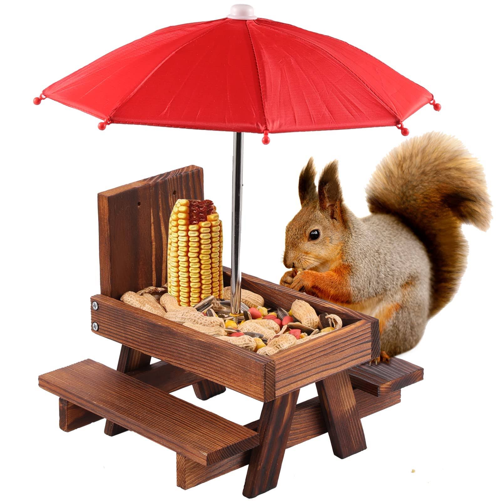 1057bef546e64c18284e1c56be38f963c4175cd3718dcb0a6bfef8edca55ac2f.jpg SKWIRRLE Squirrel Feeder Picnic Table with Umbrella, Wooden Squirrel Feeders for Outside with Corn COBs, Cute Chipmunk Feeder with Solid Structure for - Image 1