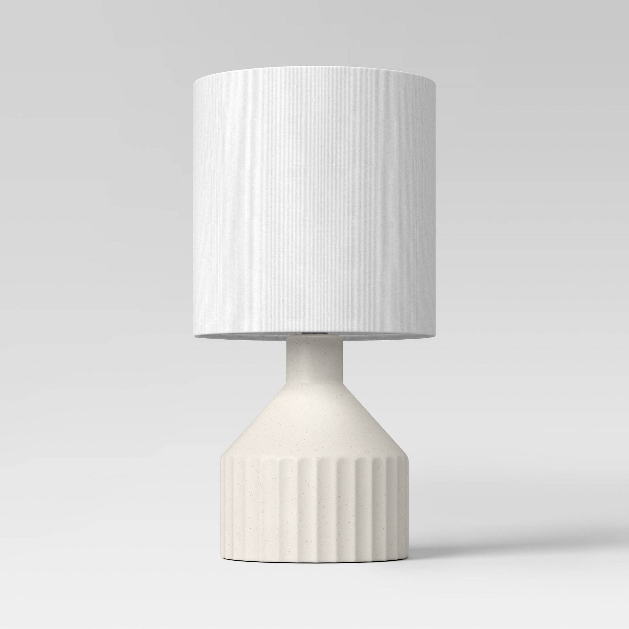 10e6634085cf6e69c1678811777865f8a9dae978ed777e556178dc1df652c2a4.jpg Ribbed Ceramic Mini Table Lamp White - Threshold - Image 1