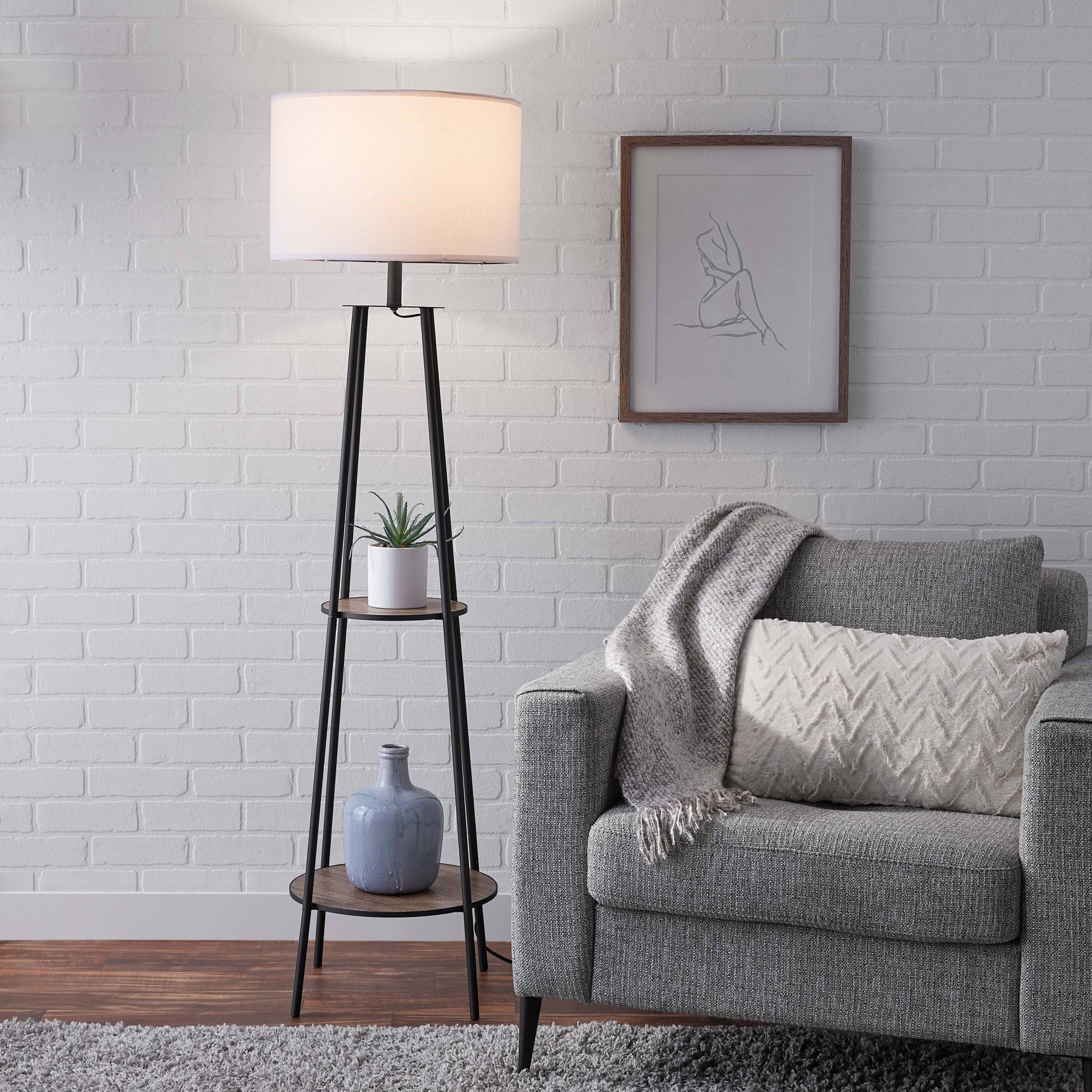 11389b688f00b9445fb7888c10c24351bcec530ed40531133fb64cd74218ea9a.jpg Mainstays Etagere Matte Black Floor Lamp, with 2 Wood Shelves, Brown - Image 1