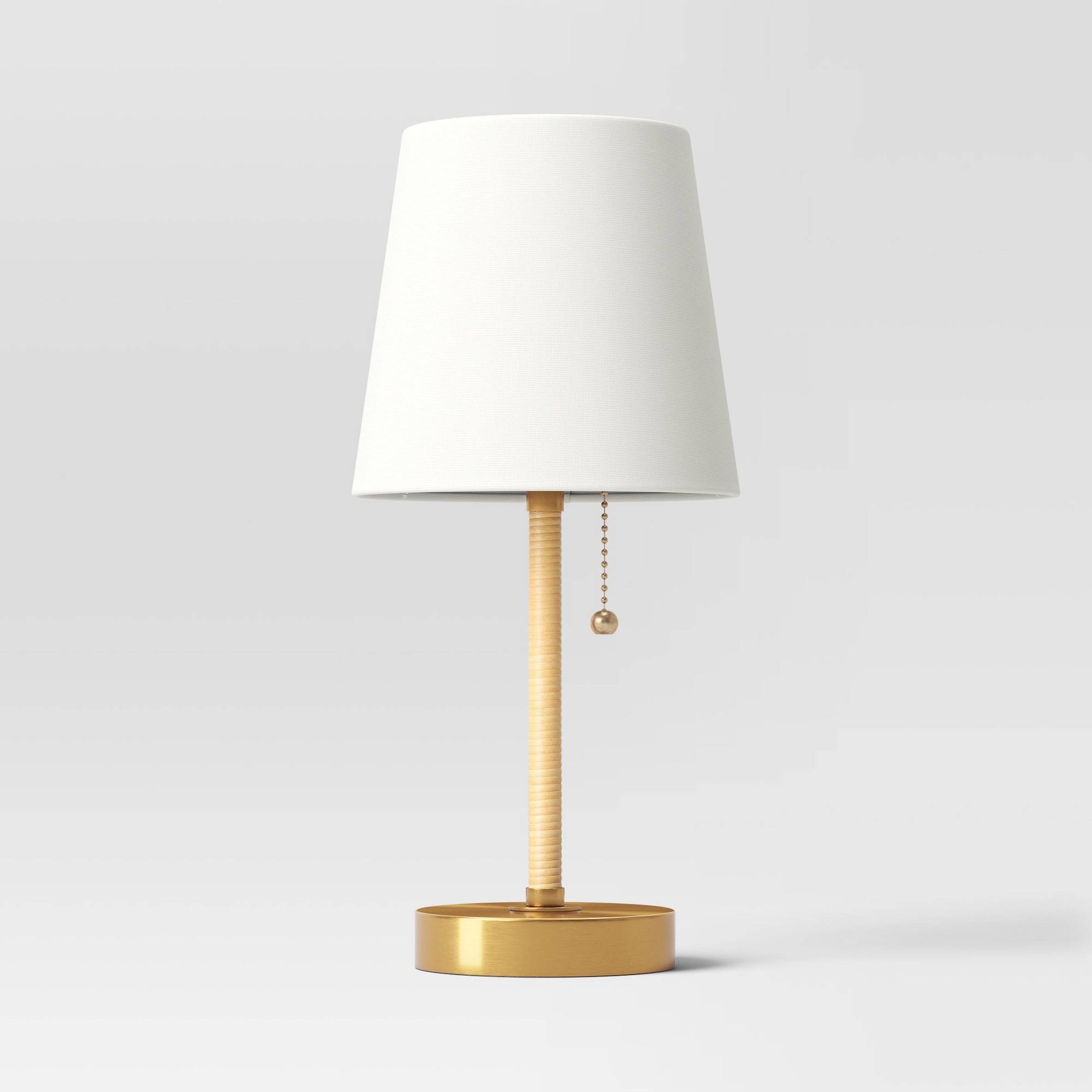 11842d31b57cef116d72fff41d7d44effd8494555aad4534df1951c3f5d3964e.jpg Threshold Mini Rattan Wrap Stick Table Lamp - Brass - 1 Each - Image 1