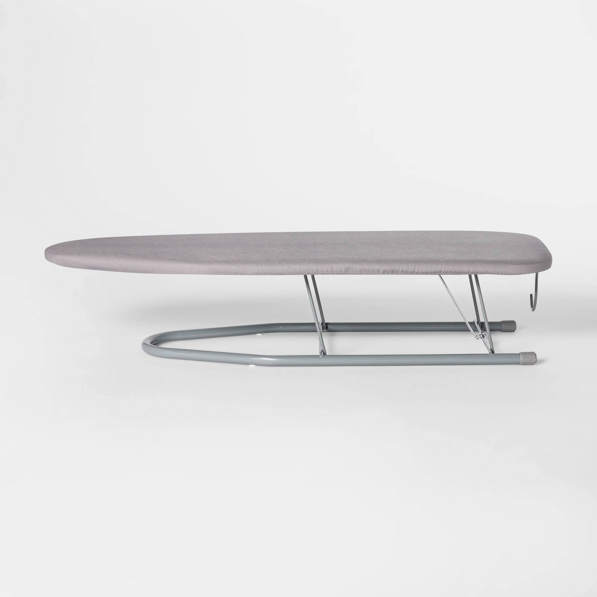 148ca61e35d3bf85b16bb9f3c9d37764c2a7f893b30310682ecb294b3599e701.jpg Room Essentials Table Top Ironing Board - Gray - 30 x 6.25 x 12 in - Image 1