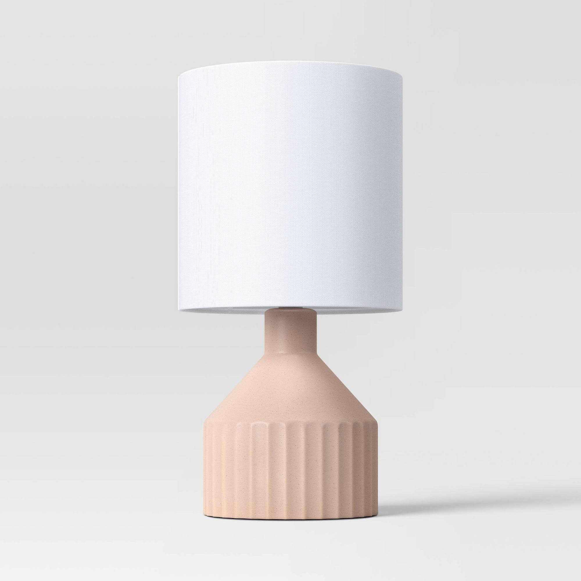 14d24a110f2b700ec97a71557dd4bb3c0c231c694dcb755c58ba80e45bad804f.jpg Ribbed Ceramic Mini Table Lamp Pink - Threshold - Image 1