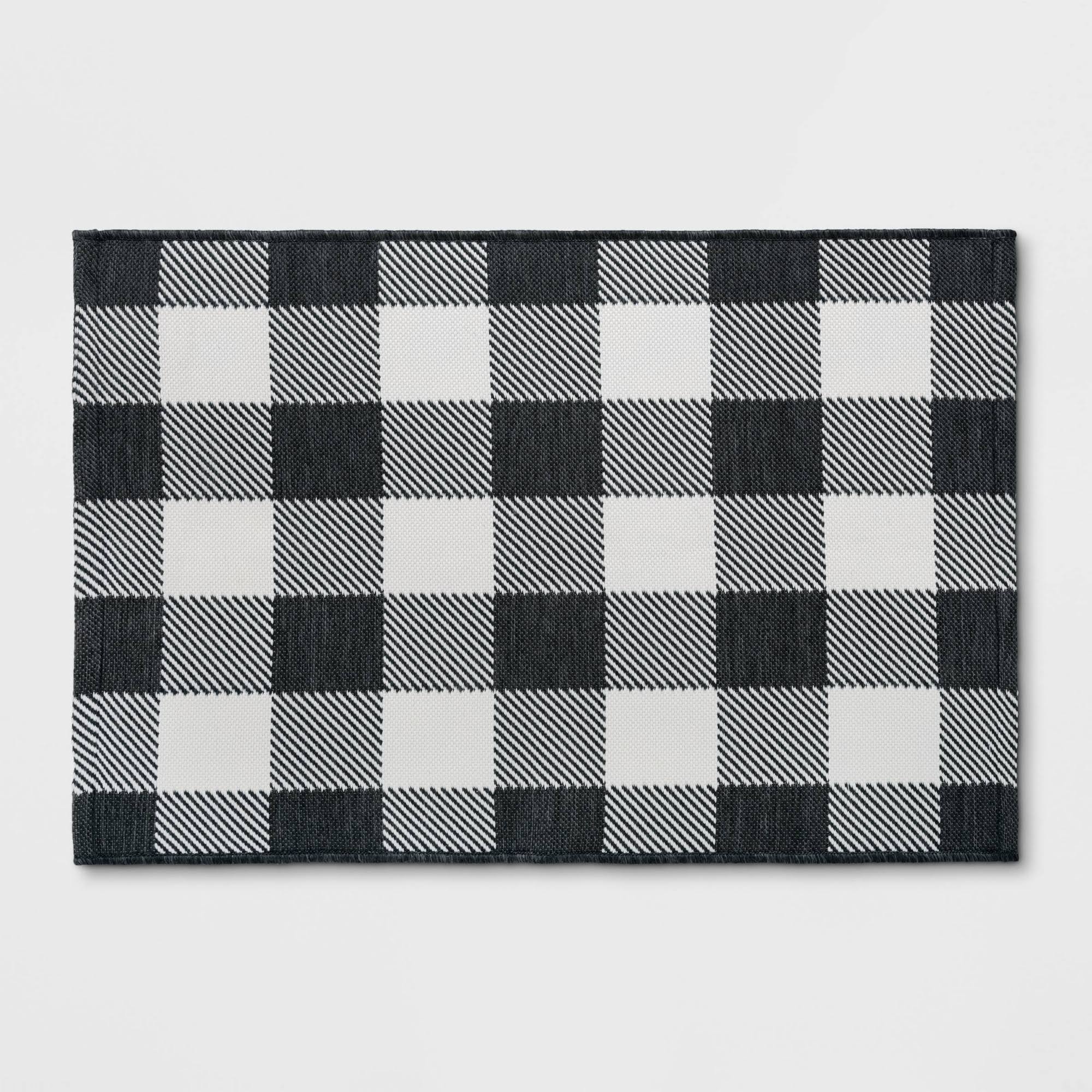 151282b0f6a731232af03d34d1f926fea8395ede94781a8a35da55569635e957.jpg 2'x3' Indoor/Outdoor Reversible Scatter Rug Black/White - Threshold - Image 1