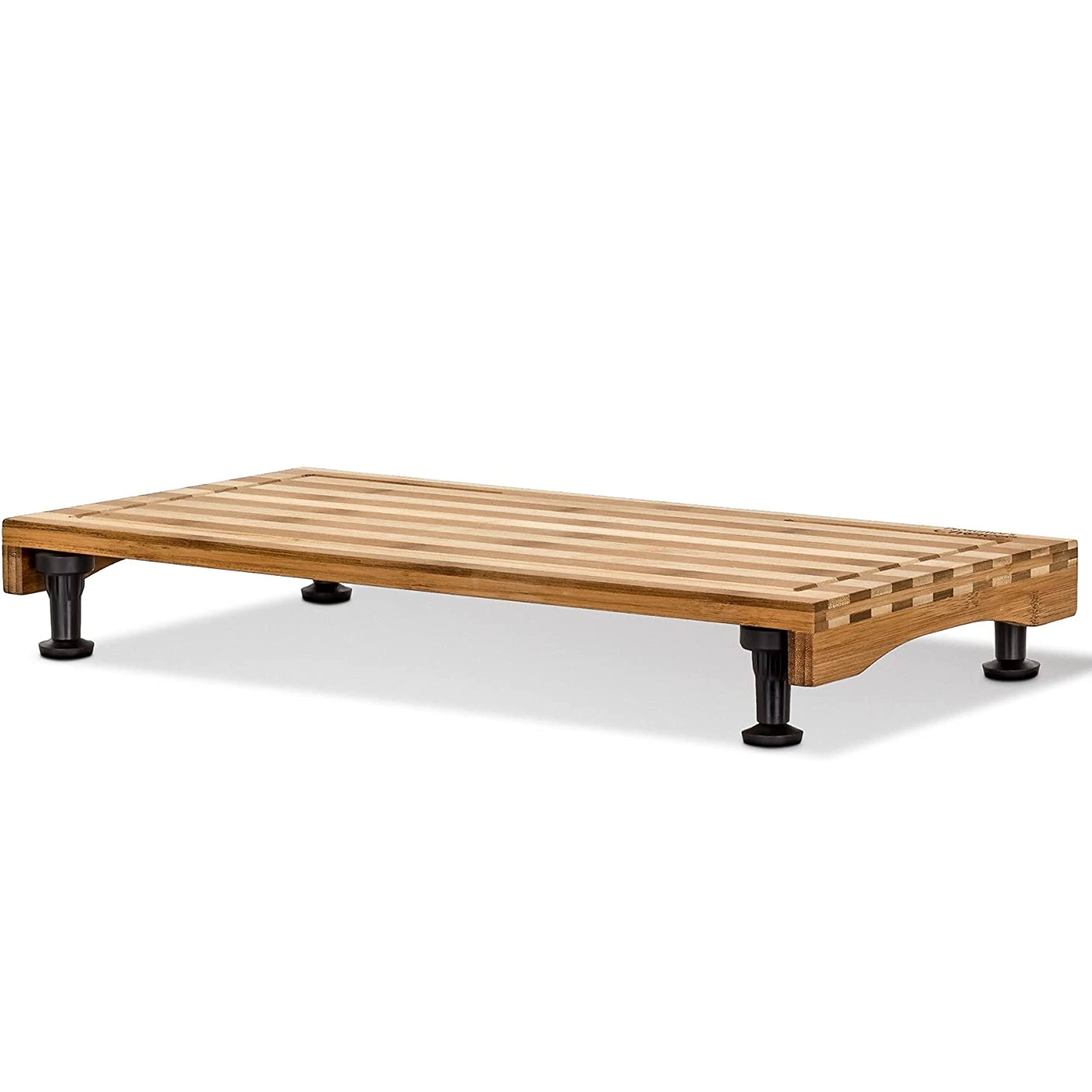 1654ab32024005411619981a4ce2b7e394908d956f6dfc63d667459bada92e9f.jpg Prosumer's Choice Dual-purpose Bamboo Stovetop Cover Workspace and Countertop Cutting Board with Adjustable Legs - Image 1