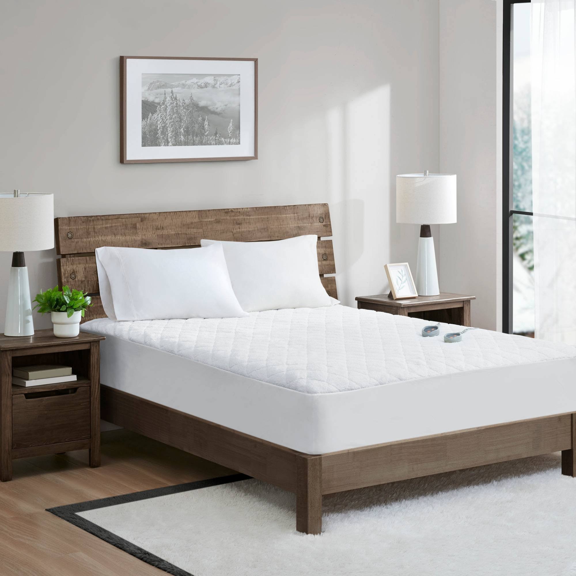 16ada39e8d5917e4b953a30c4a2698cecba5c9cefdc92cc06cfd8c1c79376180.jpg Woolrich - Heated Sherpa Mattress Pad - Queen - White - Image 1
