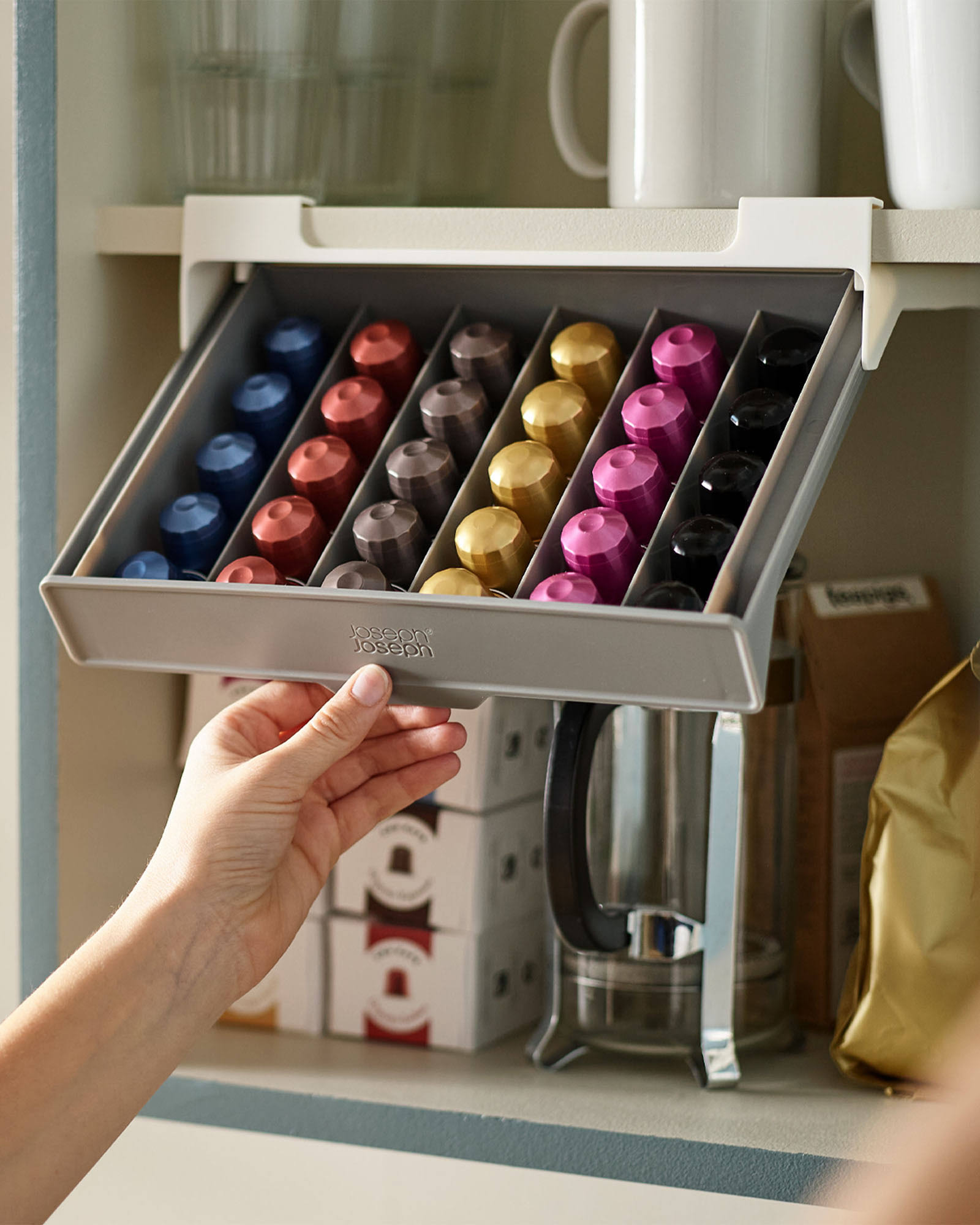 1892bda3bc7b92514f595a591fba4c4b640a9c1fa6dc01ac81cfa382e370dde8.jpg Joseph Joseph Cupboard Store Under-Shelf Coffee Pod Drawer - Gray - Image 1