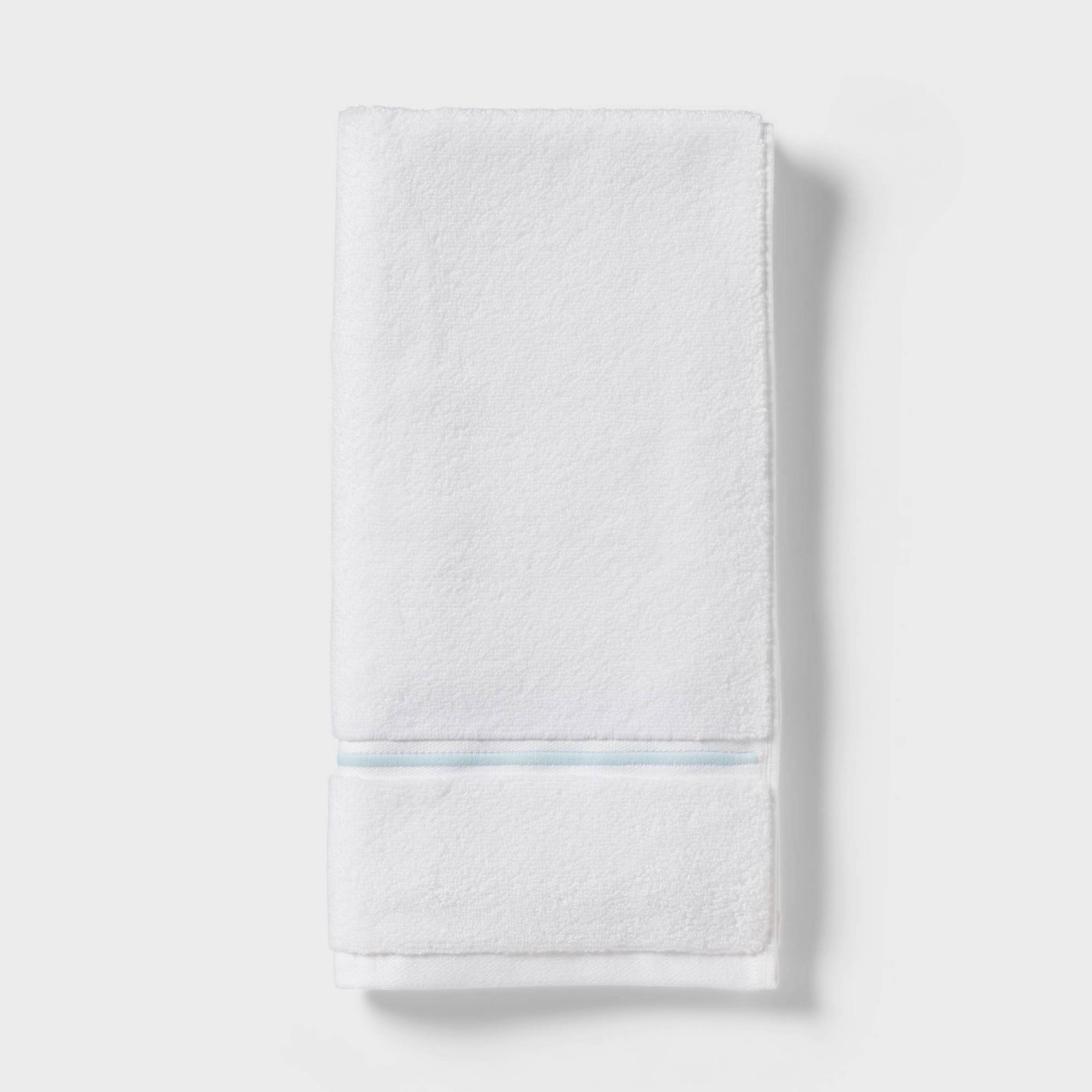 19502c7b7365891485809d59997a231da3bad46da45bd8375ba4adf1eb459bad.jpg Spa Plush Hand Towel Light Blue Embroidered - Threshold - Image 1