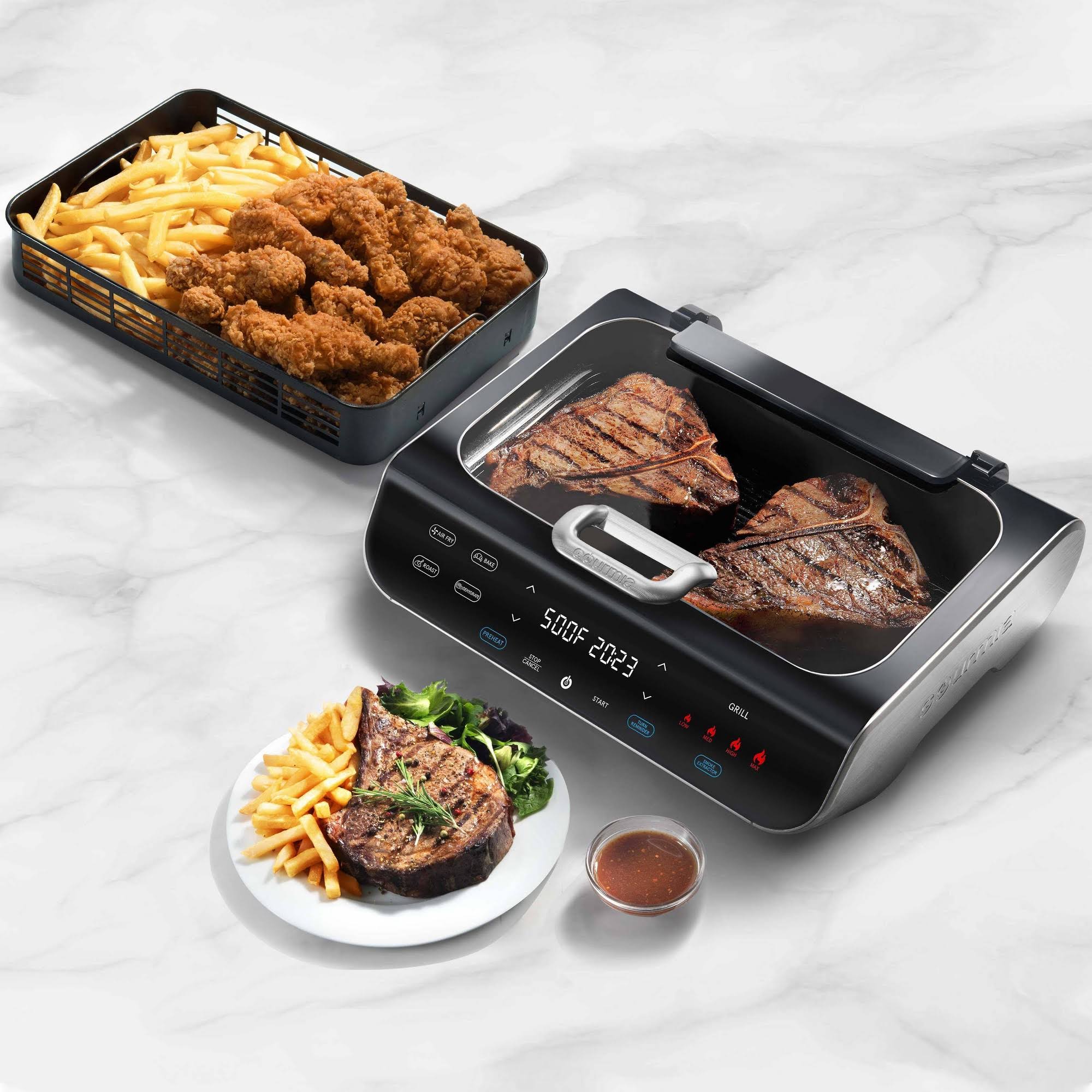 197bf31f8742b1c3ec7513f60a29c20e494699603017e94ac83ad87a8bd96d67.jpg Gourmia FoodStation 5-in-1 Smokeless Grill & Air Fryer with Smoke-Extracting Technology - Image 1
