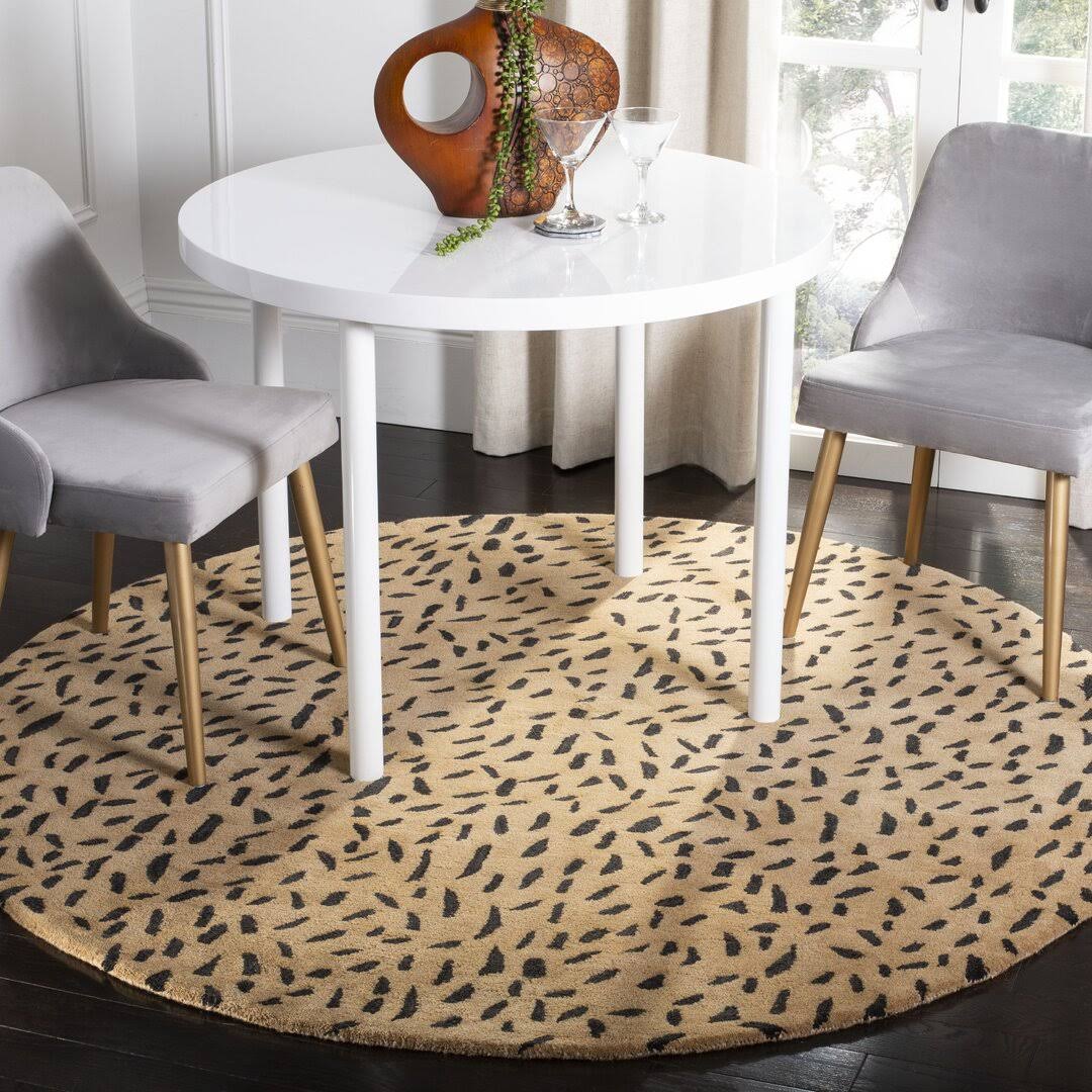 1a5a5b86b1df0dfc953df8e33d1e29dce5d25b95cb2e901966a1e8ddb60a7669-1.jpg Chanler Animal Print Hand-Tufted Wool Beige/Brown Area Rug Zipcode Design Rug Size: Round 4' - Image 1