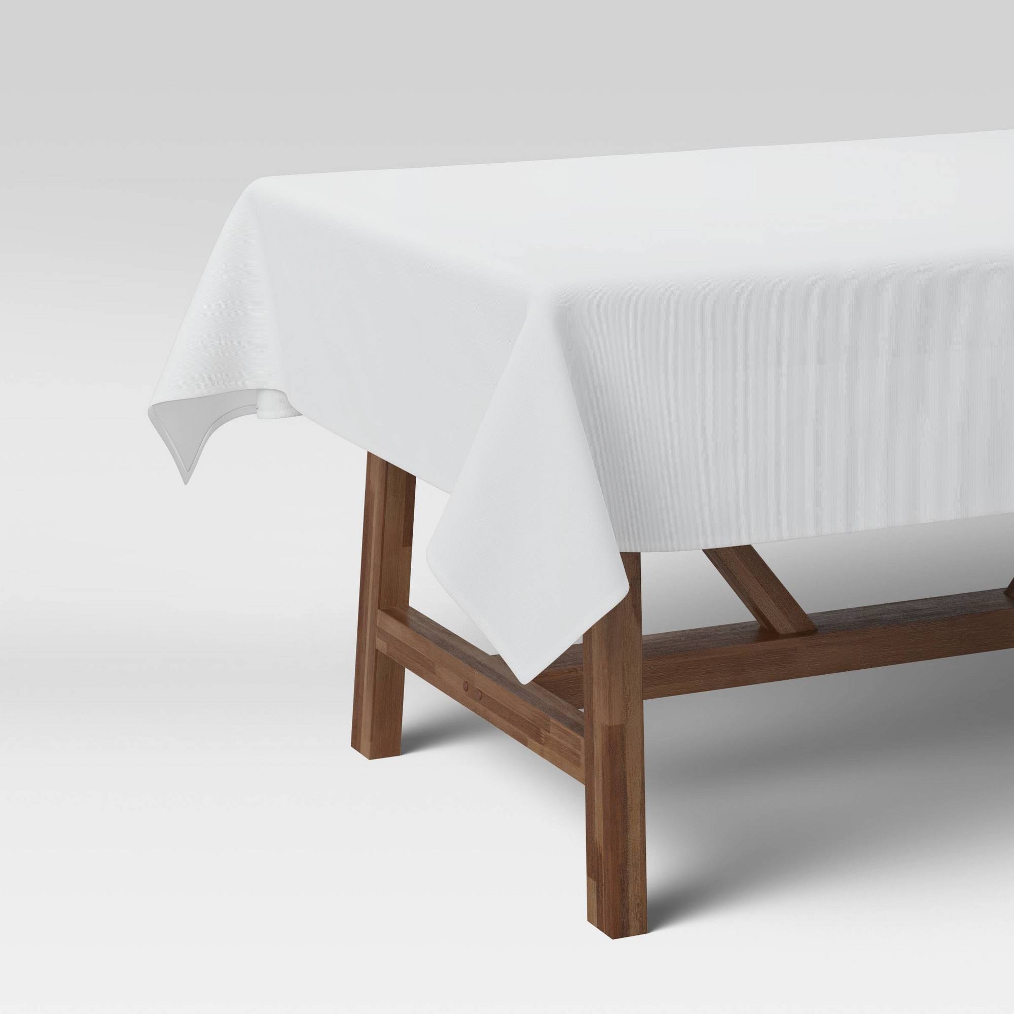 1a6c49ee60cb80ededbe35d6861fe86f4797efff260070699acc04f68d5b791e.jpg 104" x 60" Solid Tablecloth White - Threshold - Image 1