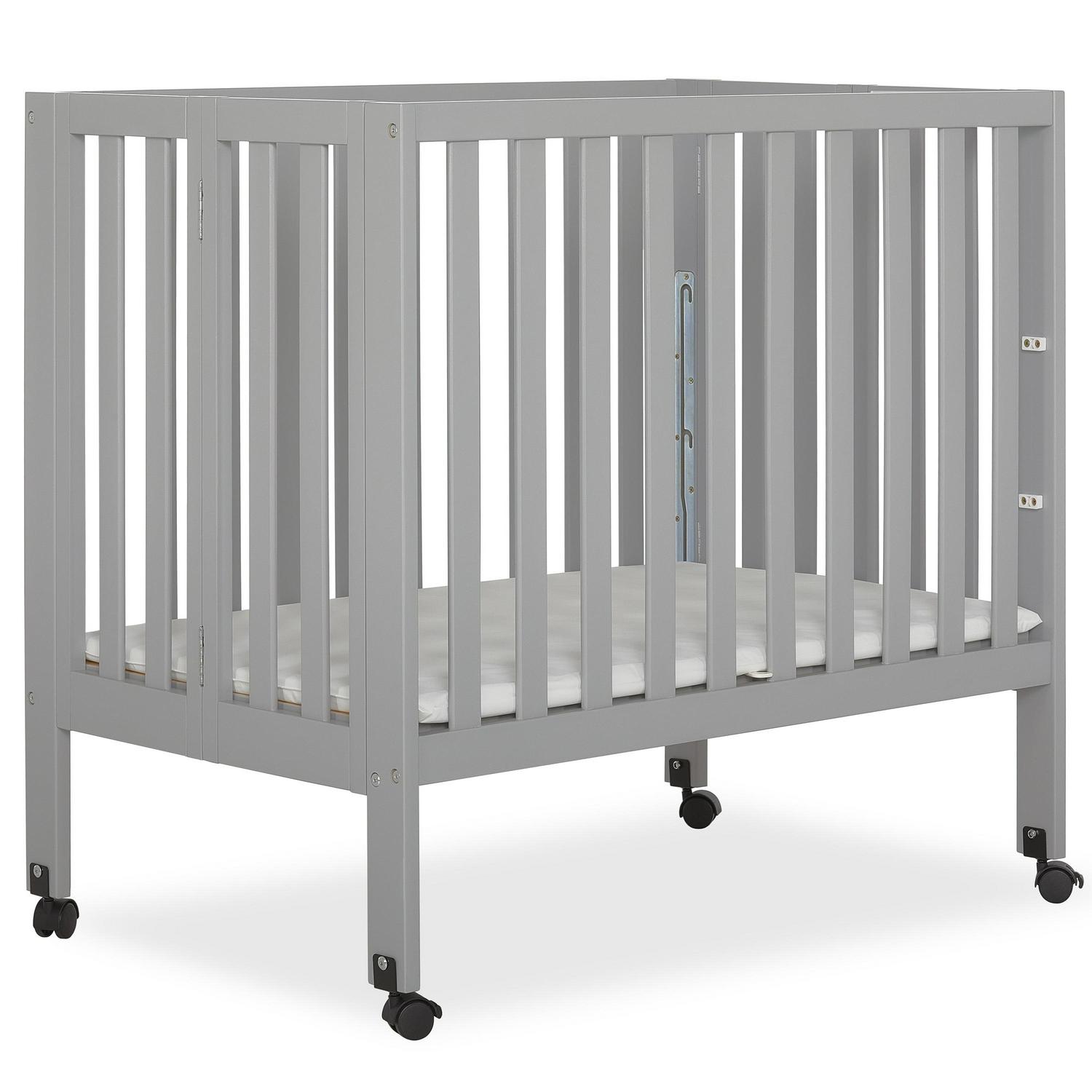 1c5a70c861310cbda8f2cc4e817c328473fef12dc9dff3598242ebff5630fbb1.jpg Dream on Me Jett Non - Full Size Folding Crib I Removable Wheels I Modern Nursey I Adjustable Mattress Support I Patent Folding System I Included 2.5 Mattress in Pebble Gray - Image 1