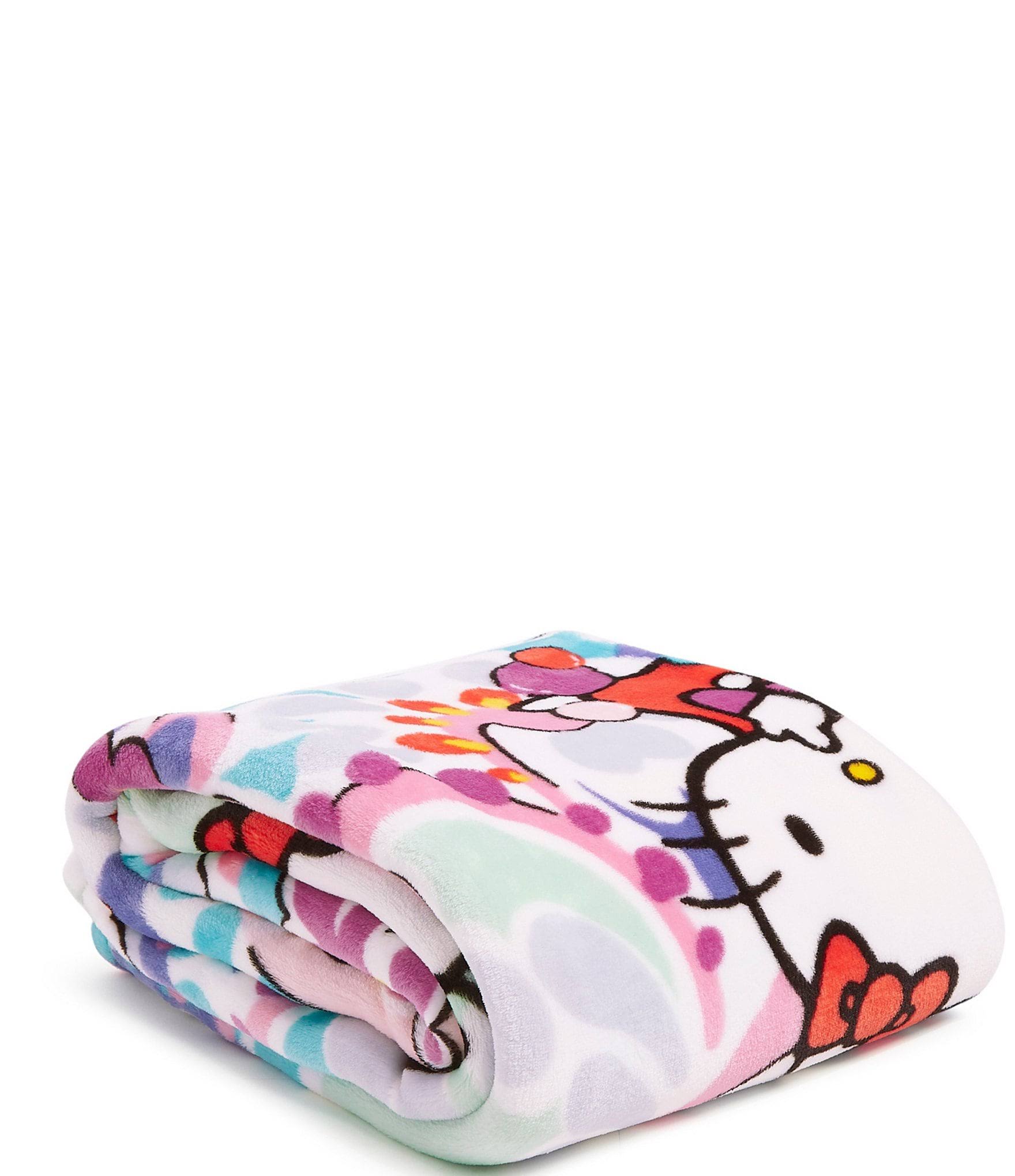 1d0b44bd76389a4da66a869f776841ba83f55188c59d2a78a82b4b6ec9d4fe81.jpg Vera Bradley Plush Throw Blanket in Hello Kitty Paisley - Image 1