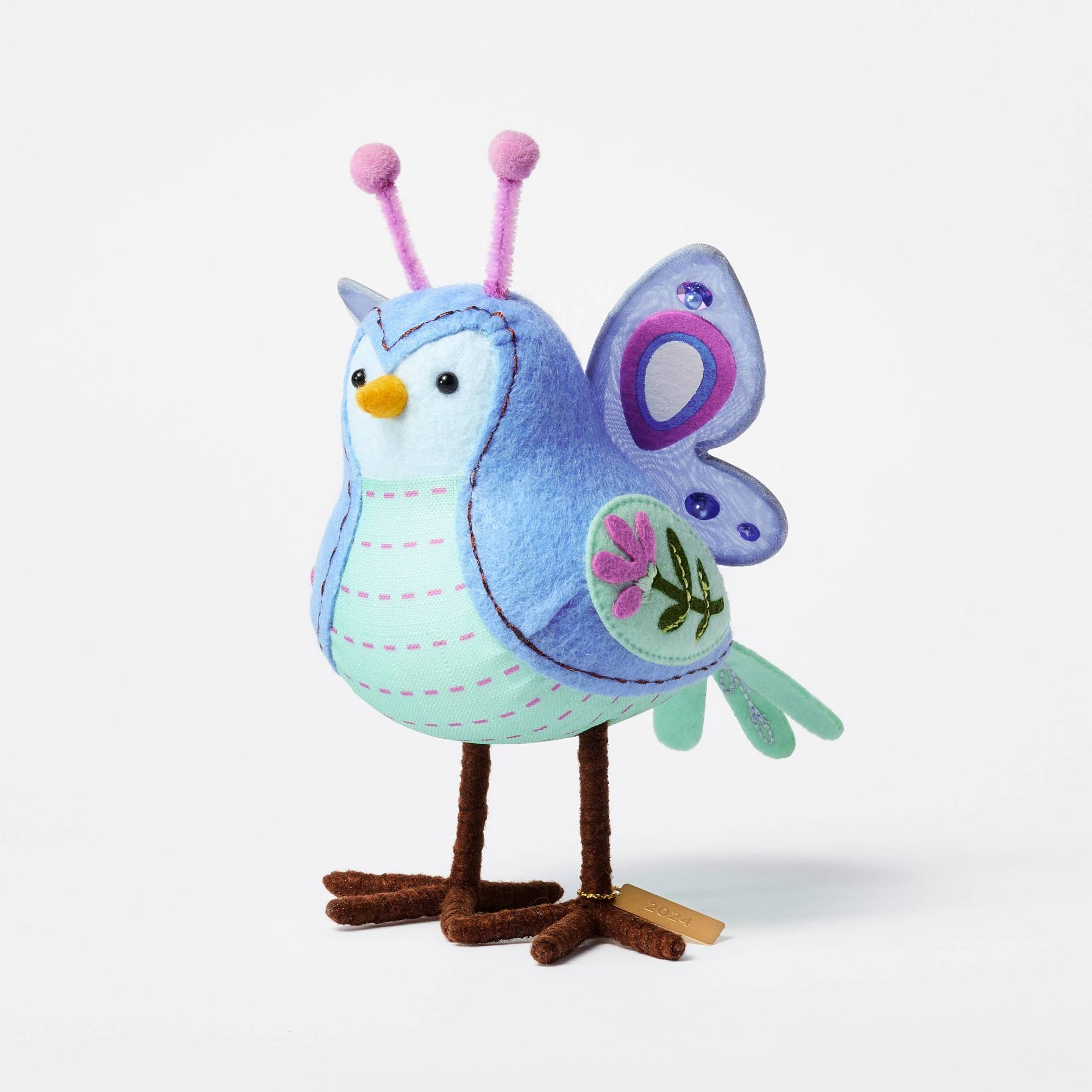 20ca469249fe645a32c5720a9a1c5f8ba15d1d806cff4ea4dcf66537d2e9b50c.jpg Featherly Friend Easter Fabric Bird Decor Blue Butterfly - Spritz - Image 1