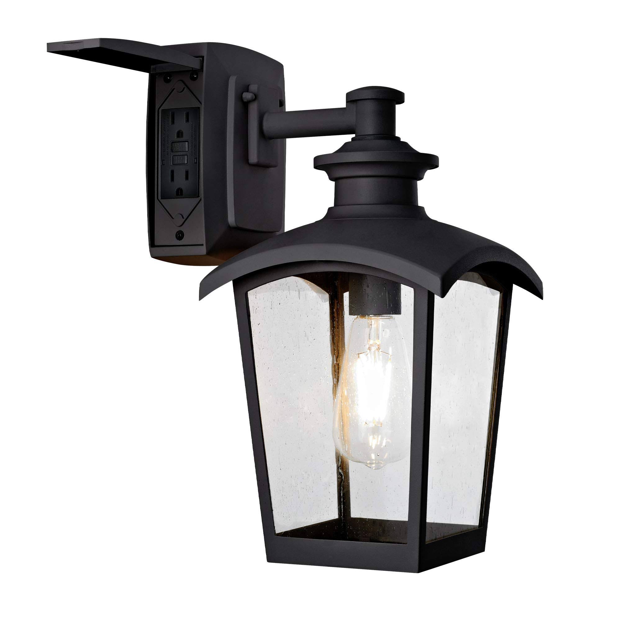 24ed0036c09846c3d1fe034e954ca412c8889f8401d30b88254c68d735f14e81.jpg Home Luminaire 31703 Spence 1-Light Outdoor Wall Lantern with Seeded Glass and Built-In GFCI Outlets Black - Image 1