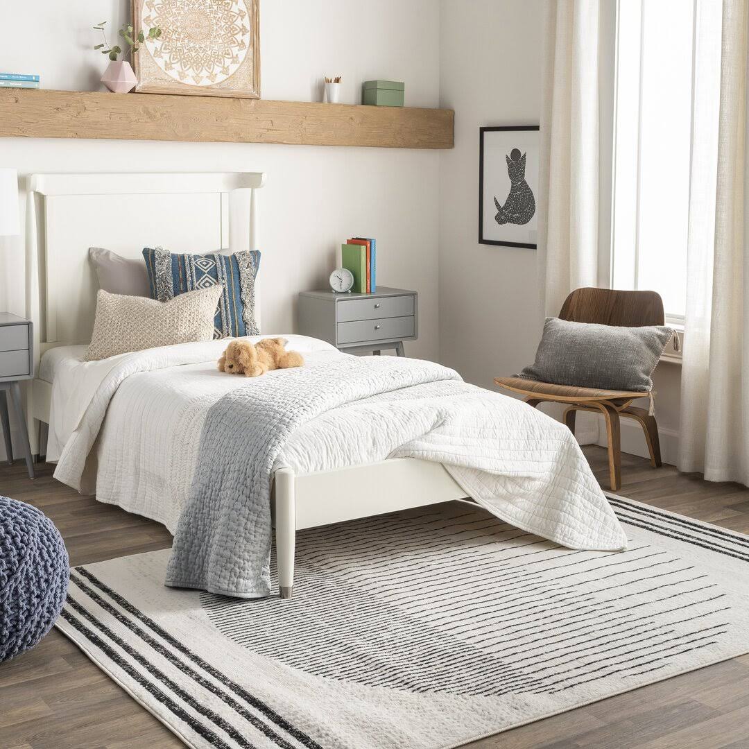 25ed4853f5eb3f3783693fa829631c31f867c47b649d6268d0282b3d3a16a506.jpg Corum Abstract Black/Ivory Area Rug Trent Austin Design Rug Size: Rectangle 4'3" x 5'7" - Image 1
