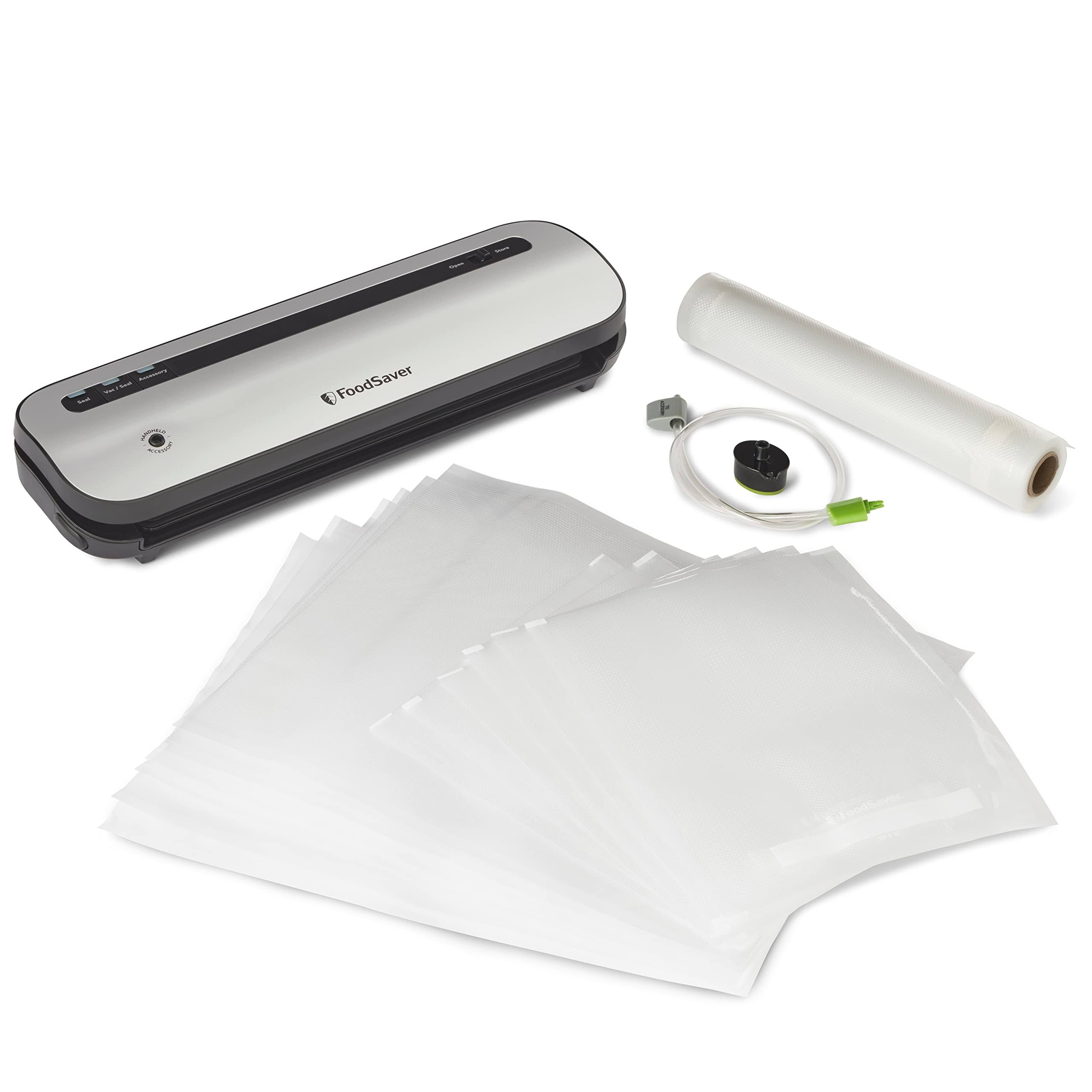 277899a4c2385d3f26f2c04a285ff7966116f13b08f1b4632fb18926b3a62912.jpg Foodsaver Space-Saving Vacuum Sealer with Bags and Roll, Silver - Image 1