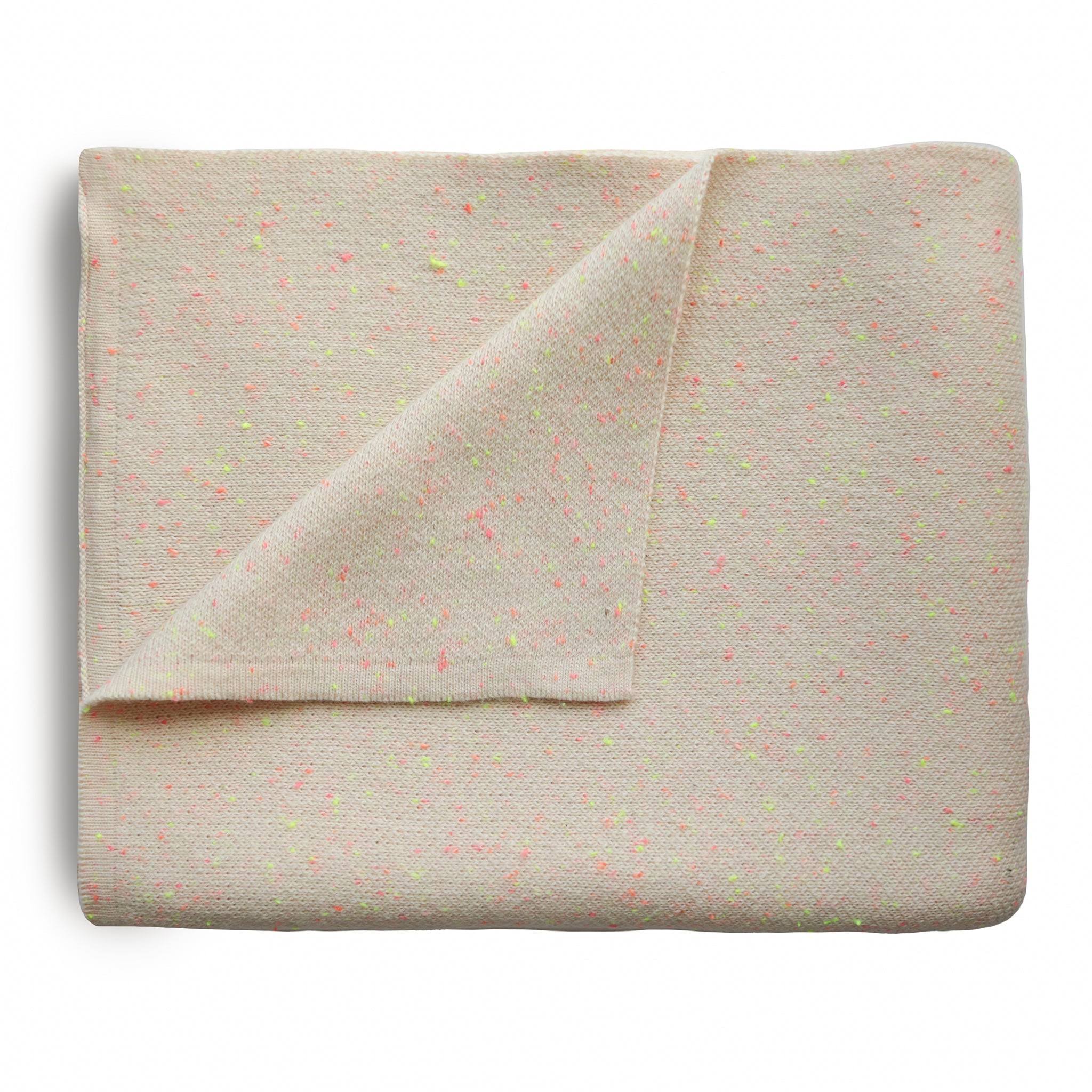 27cf37255ffb36c70ba92890890b2a52da1ad5062547619e86348f9fc9a11d89.jpg Mushie Knitted Confetti Baby Blanket (peach) - Image 1