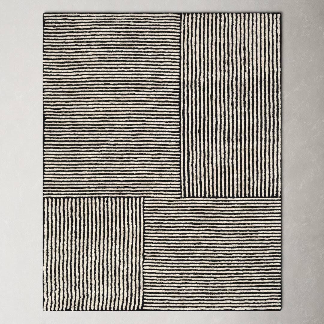 28dc477e921c33faeb76d23e05f73a32bc02ab42c71badc75c78328653f65f93.jpg Balos Hand Tufted Black/Ivory Rug AllModern Rug Size: Rectangle 2' x 3' - Image 1