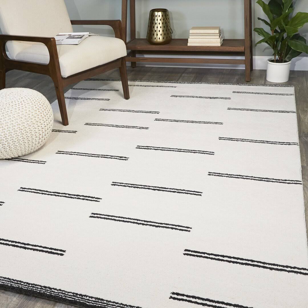 299e0456d55d69109ddd9ea6807ad495fe726a427c3dd8b3a77cc697192d6344.jpg Agnes Geometric Ivory Area Rug AllModern Rug Size: Rectangle 5'3" x 7' - Image 1