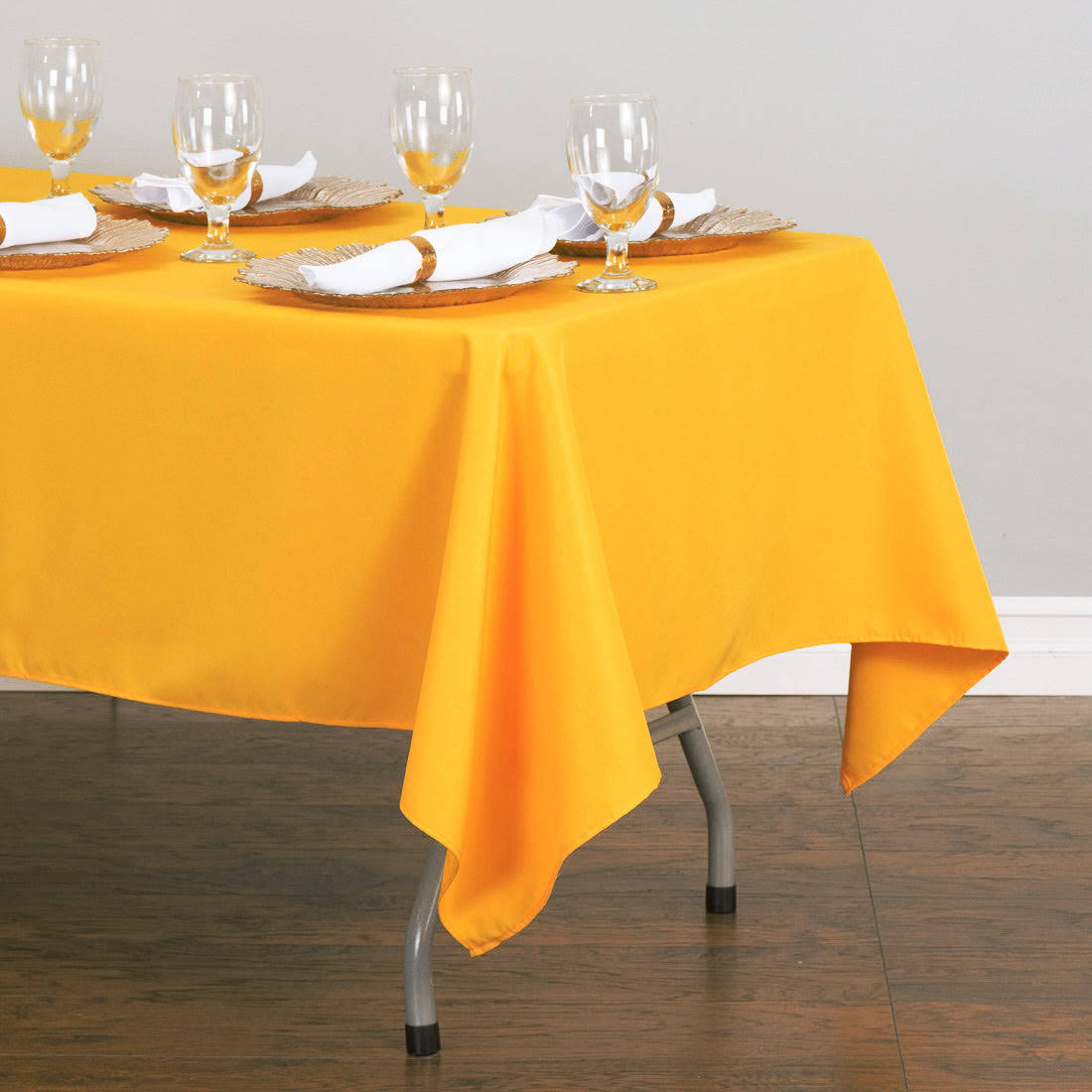 318e7317433287389dca0c623252f88002883de372dcd7dc4decbfc91de8d546.jpg Linentablecloth 60 x 102 in. Rectangular Polyester Tablecloth Gold - Image 1