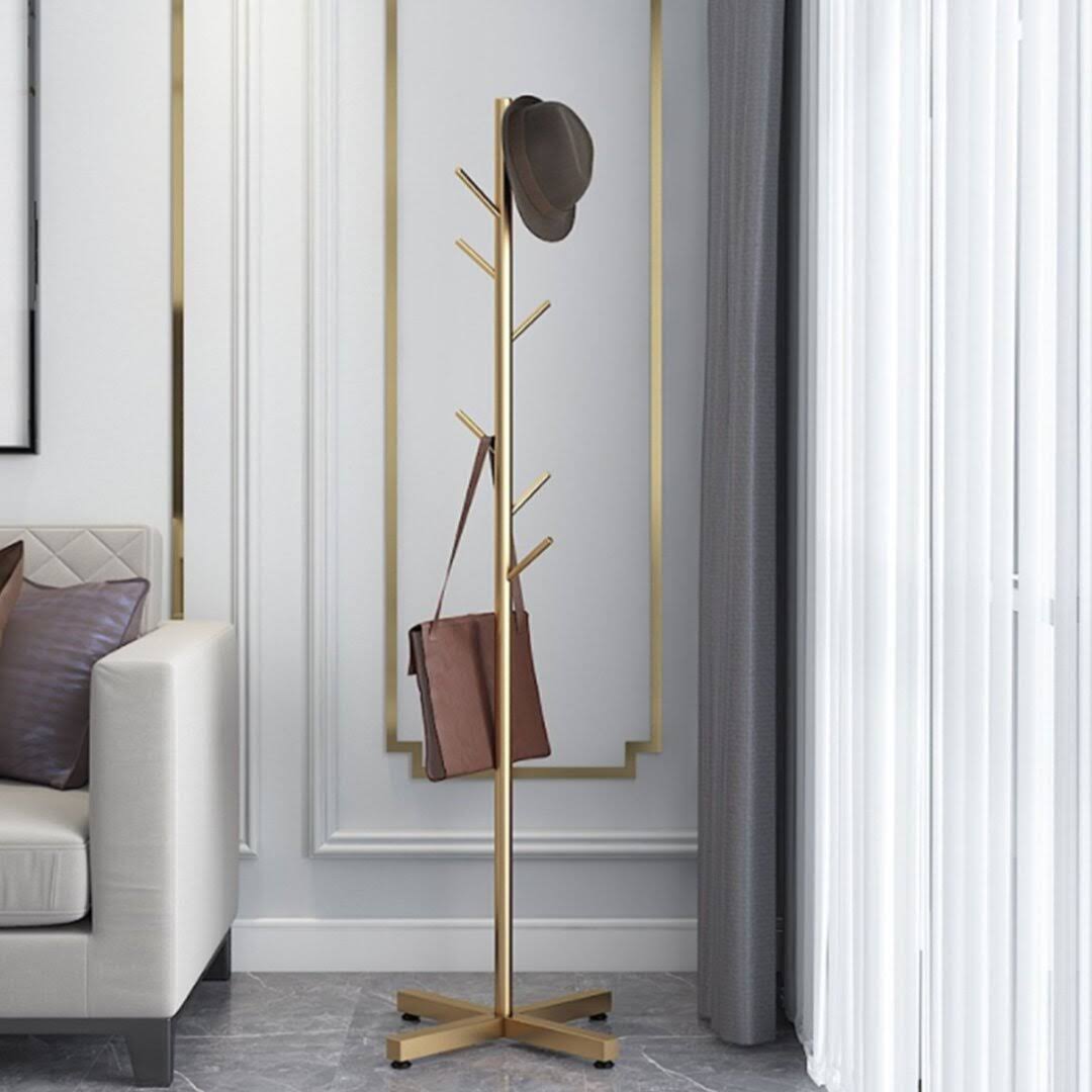 328a09cd228bc0b5df374ad25fdb6b8e913e70d416b49d96e468182eecc6ca60.jpg Dianthe Modern Free-Standing Metal Coat Rack w/7 Hooks Rebrilliant Color: Gold - Image 1
