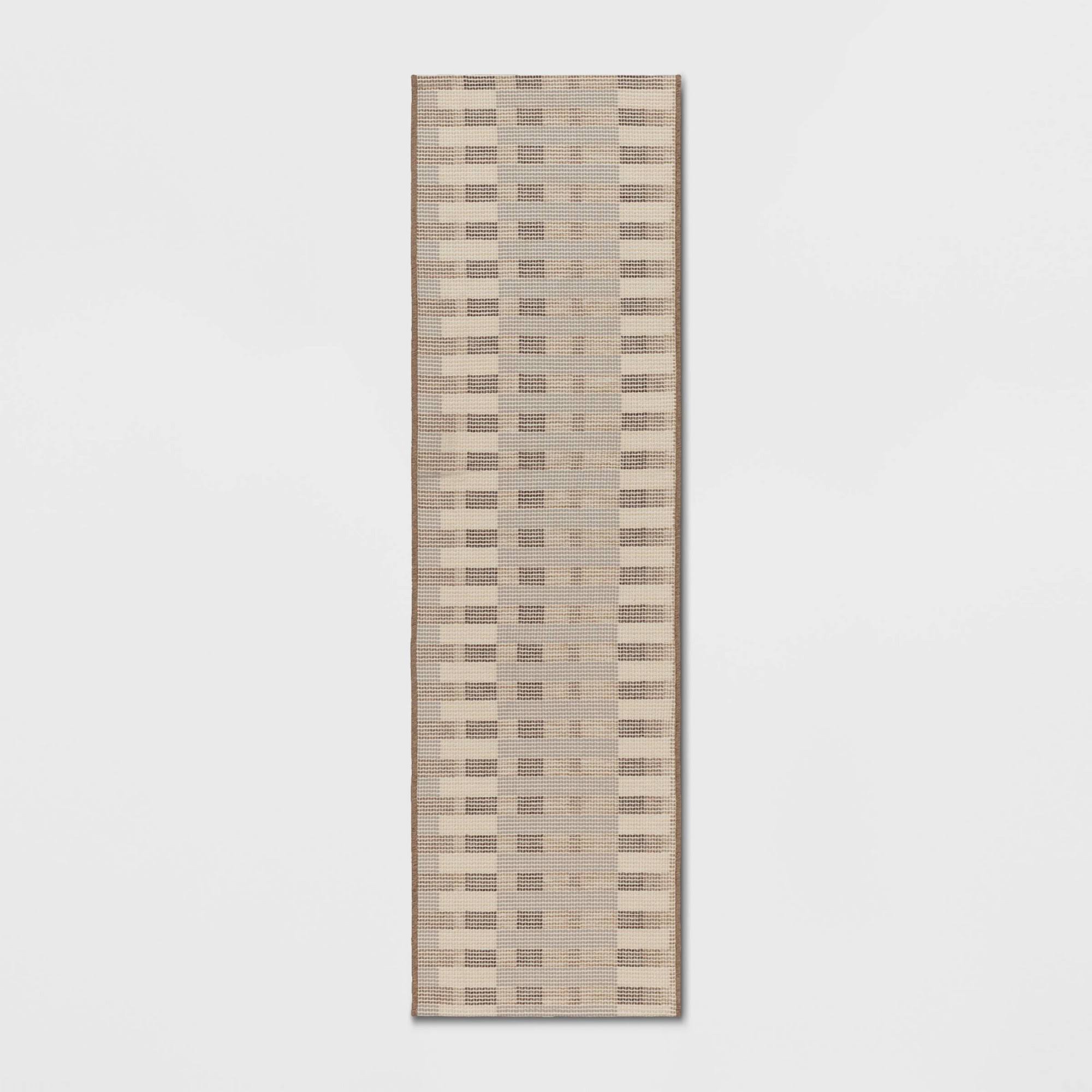 32ee8a5a2ac2b051e4ca57070bfbb73fe15ea9999af5b277a8c873311256315e.jpg 2'x7' Beachside Grid Outdoor Rug Naturals ÿ Threshold Designed with Studio McGee - Image 1