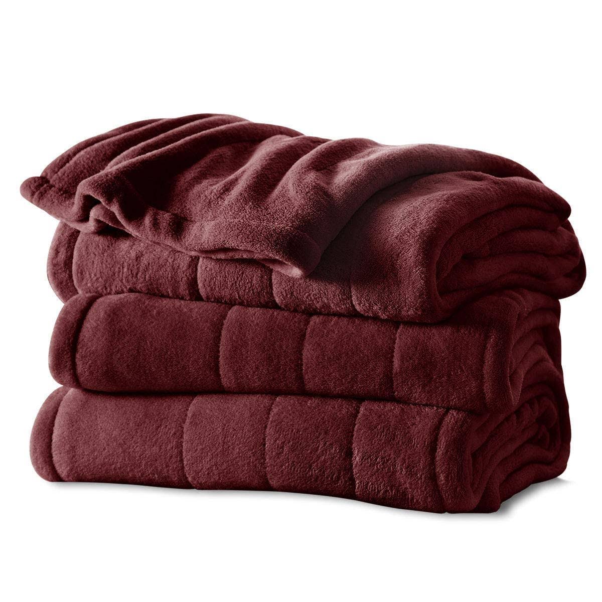 37b6b14de831993b1da6979dbf9c38ba4bc462a45d46a79532b09c1a50a4fe0b.jpg Sunbeam Channeled Microplush Electric Heated Warming Blanket Full Garnet, Red - Image 1