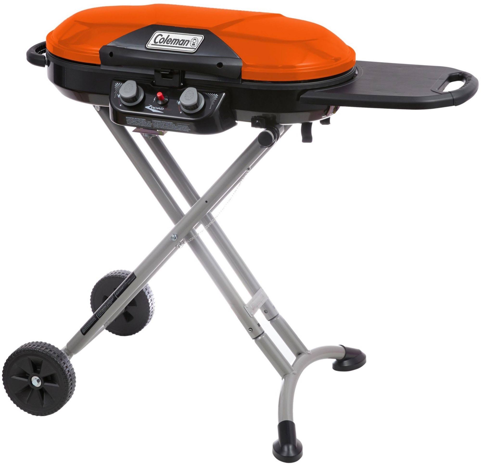 3aed5214edcd78d584be71a87cd12406029d3b582e7e2656768926471b22b3e6.jpg Coleman Roadtrip X-Cursion Portable Propane Grill in Orange - Image 1