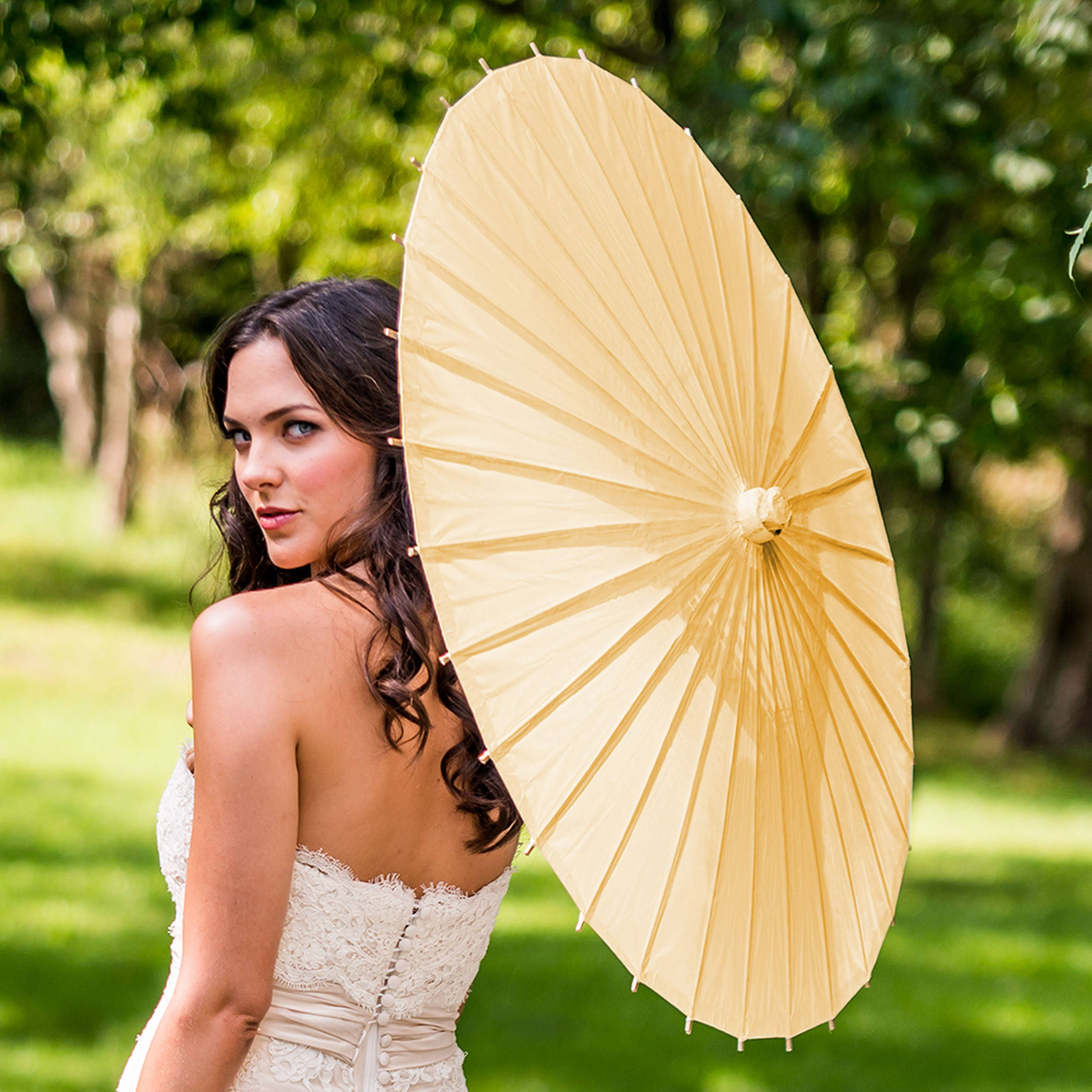 3b6c2b353afe8149e29992bf1f5cd606b7fd0a8e1766987026e7aca89a0c3ed7.jpg Weddingstar 9167-79 Paper Parasol with Bamboo Boning, Ivory - Image 1