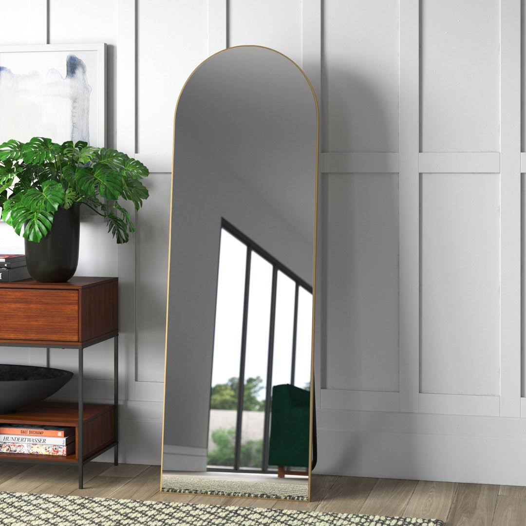 3e23857a9224264fcb1d233816f8cc0dde244f6830716e29e982e3ea71d9e9b5.jpg Greta Sleek Arched-Top Wall Mirror Mercury Row Finish: Gold - Image 1