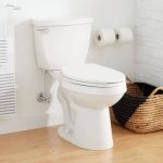 Signature Hardware 462379 Bradenton 1.28 GPF Two Piece Elongated Toilet with 14" Rough-In Rough-In Size: 12", Lever Location: Left