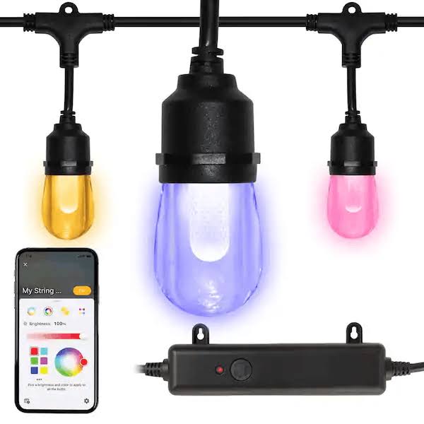 4051fb7d32f0b5a3af9efe4aa6a3a58593843d57a6ccd1712b010a0f3fd76ce4.jpg Hampton Bay Indoor/Outdoor 12-Light 24 ft. Smart Plug-In Edison Bulb RGBW Color Changing LED String Light Powered by Hubspace - Image 1
