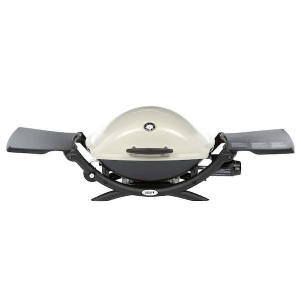 42d6939344f125bc322265cf6f4ddbdbe8081703746dd4ffa019319e51ac2042.jpg Q 2200 1-Burner Portable Propane Gas Grill in Titanium with Built-In Thermometer - Image 1