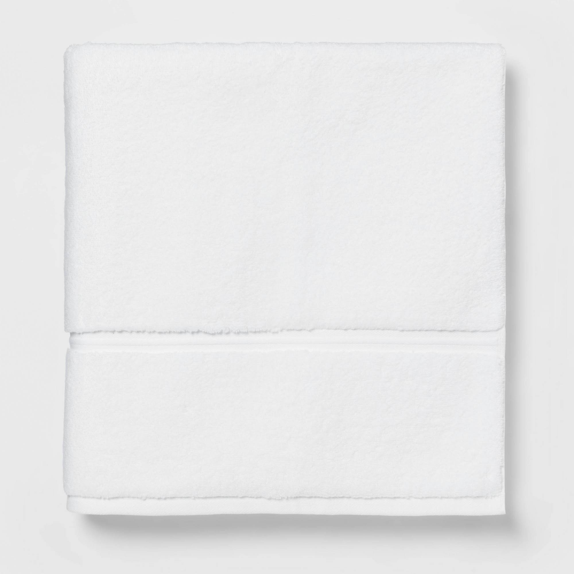 46013d3d374b8ee7d60824521c7c47ba7dfadd67a96d3f212dcb926f73e699ce.jpg Oversized Spa Plush Bath Towel White - Threshold - Image 1