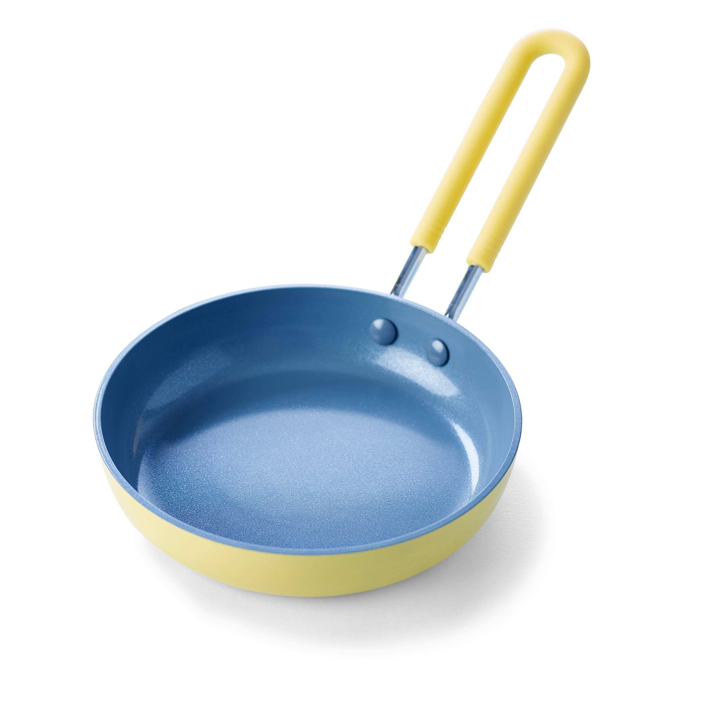 4772f824b98bf485d93ec1e3df98199443299d48e8eba2fd16aa6241b74edfc6.jpg GreenPan Sunflower Yellow Ceramic Non-Stick Mini Egg Pan - Image 1