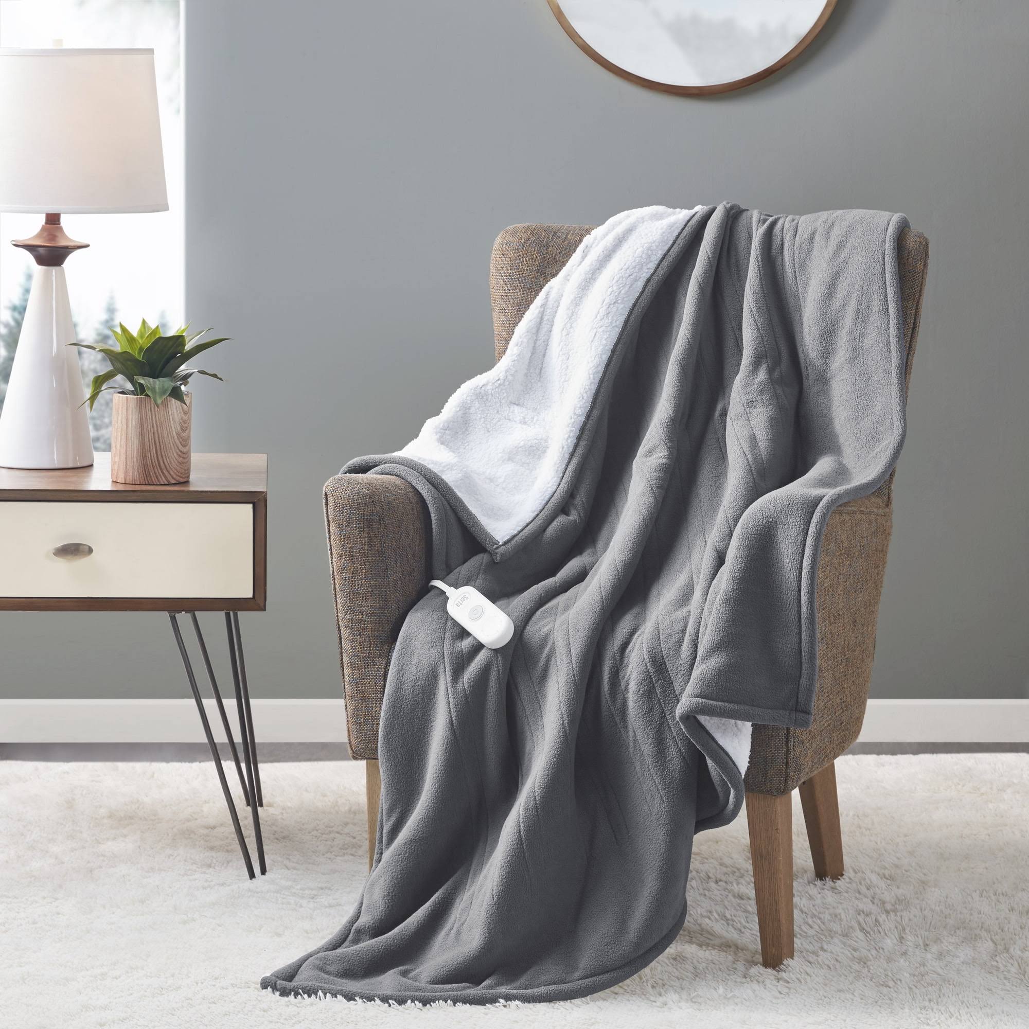 4c1fb7c8badeb21b93321f375cb2bcd431f231d5e23a518d223e53c70c68d292.jpg Serta Fleece to Sherpa Heated Throw, 50x60 inch, Dark Grey - Image 1