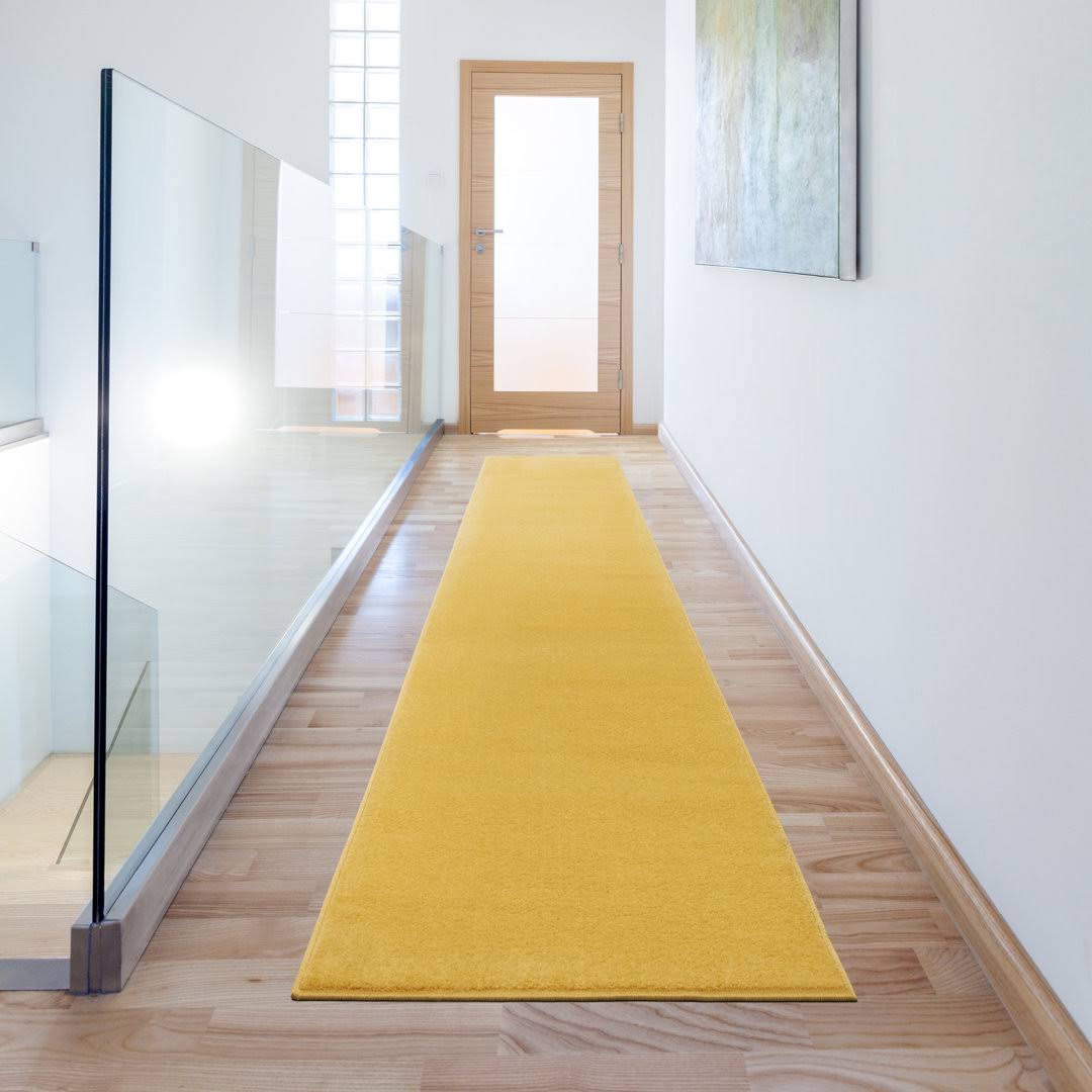 4d3cf91f85cbd926462c5592785d46a44442cc0f5985223f73351d4d32dc2bc9.jpg Mullican Sandy Solid Yellow Easy Care Area Rug Trent Austin Design Rug Size: Runner 2'2" x 12' - Image 1