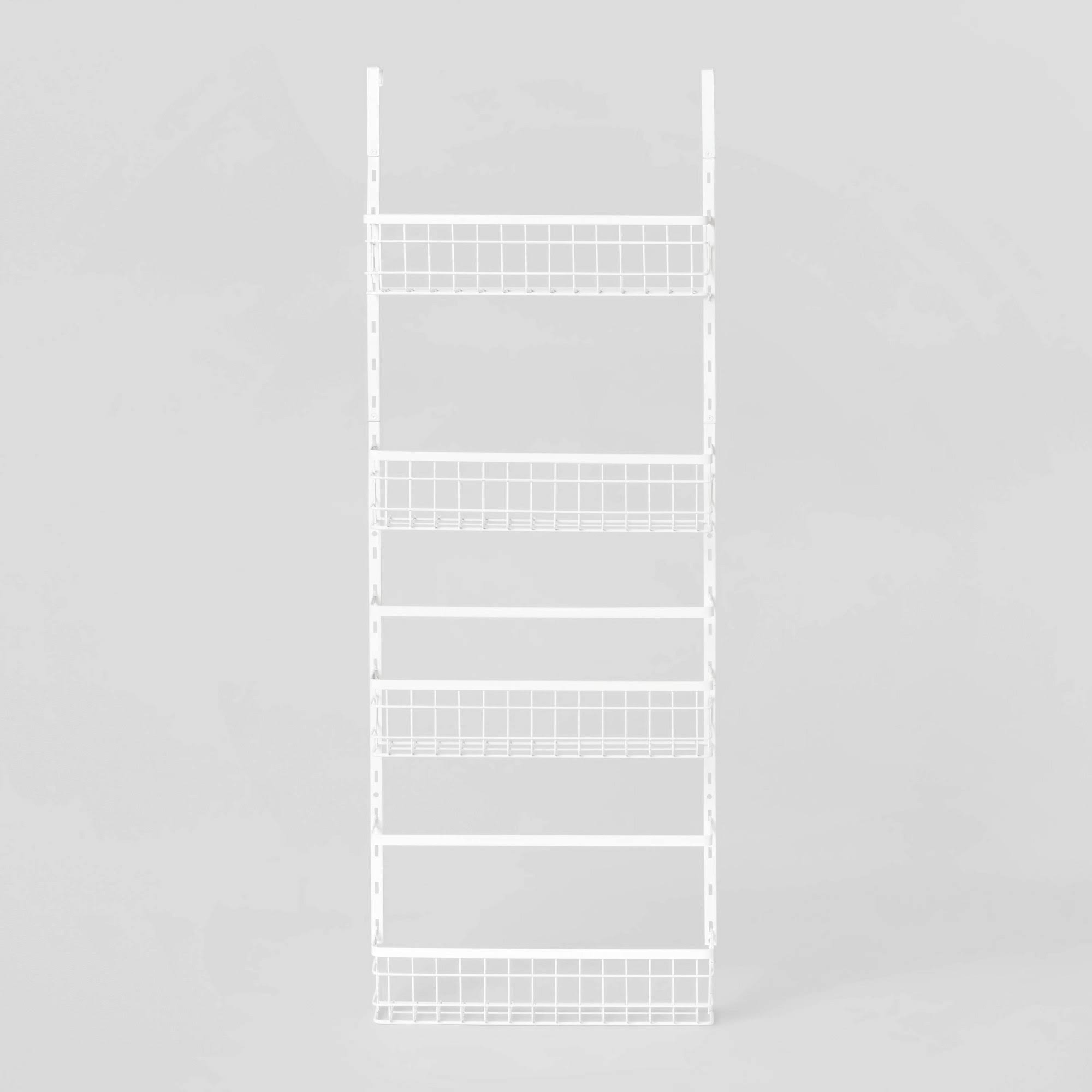 4df9c476113928feceafa7e4798273da6e01a17aab148d7c11add940c9079eca.jpg 4 Tier Over-The-Door Storage Rack - Brightroom - Image 1