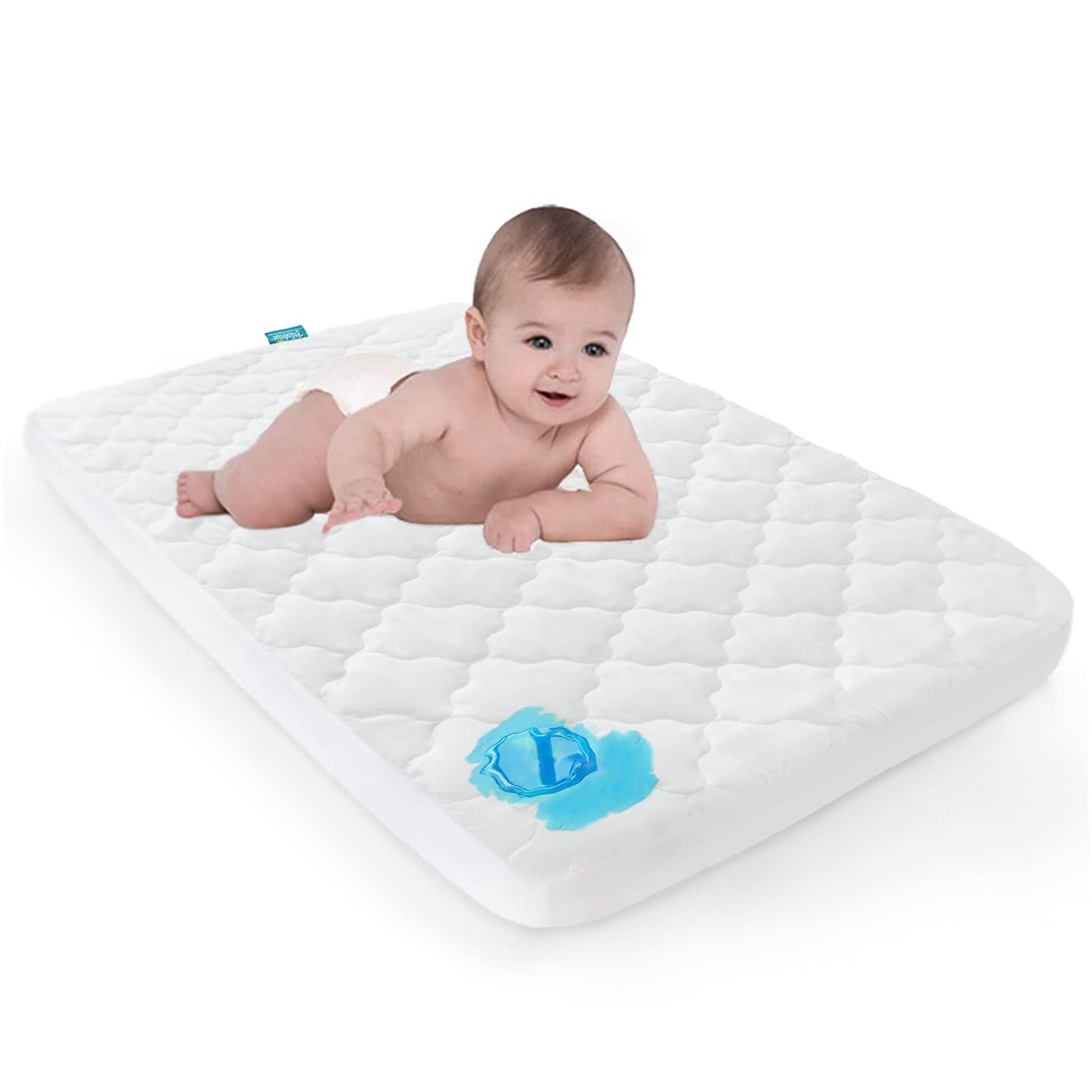 51efe6483a6dfbb183ea0f3e128e6050bd82935665893cb2b9ed89264971f73a.jpg Biloban Pack N Play Waterproof Baby Crib Mattress Pad - 39" x 27" Fitted Cover Protector for Mini & Portable Playard Mattresses - Image 1